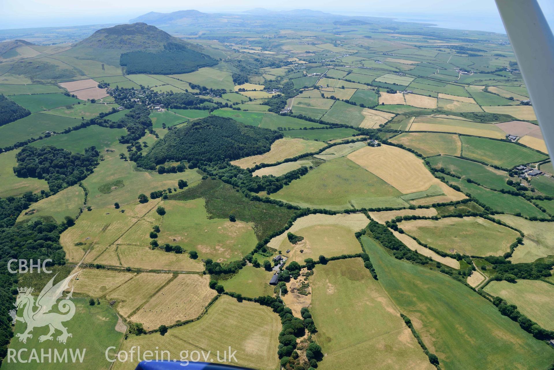 Aerial photograph: Capel Peniel, defended enclosure cropmark. Crown: CHERISH PROJECT 2018. Produced with EU funds through the Ireland Wales Co-operation Programme 2014-2020 (NGR SH287380)