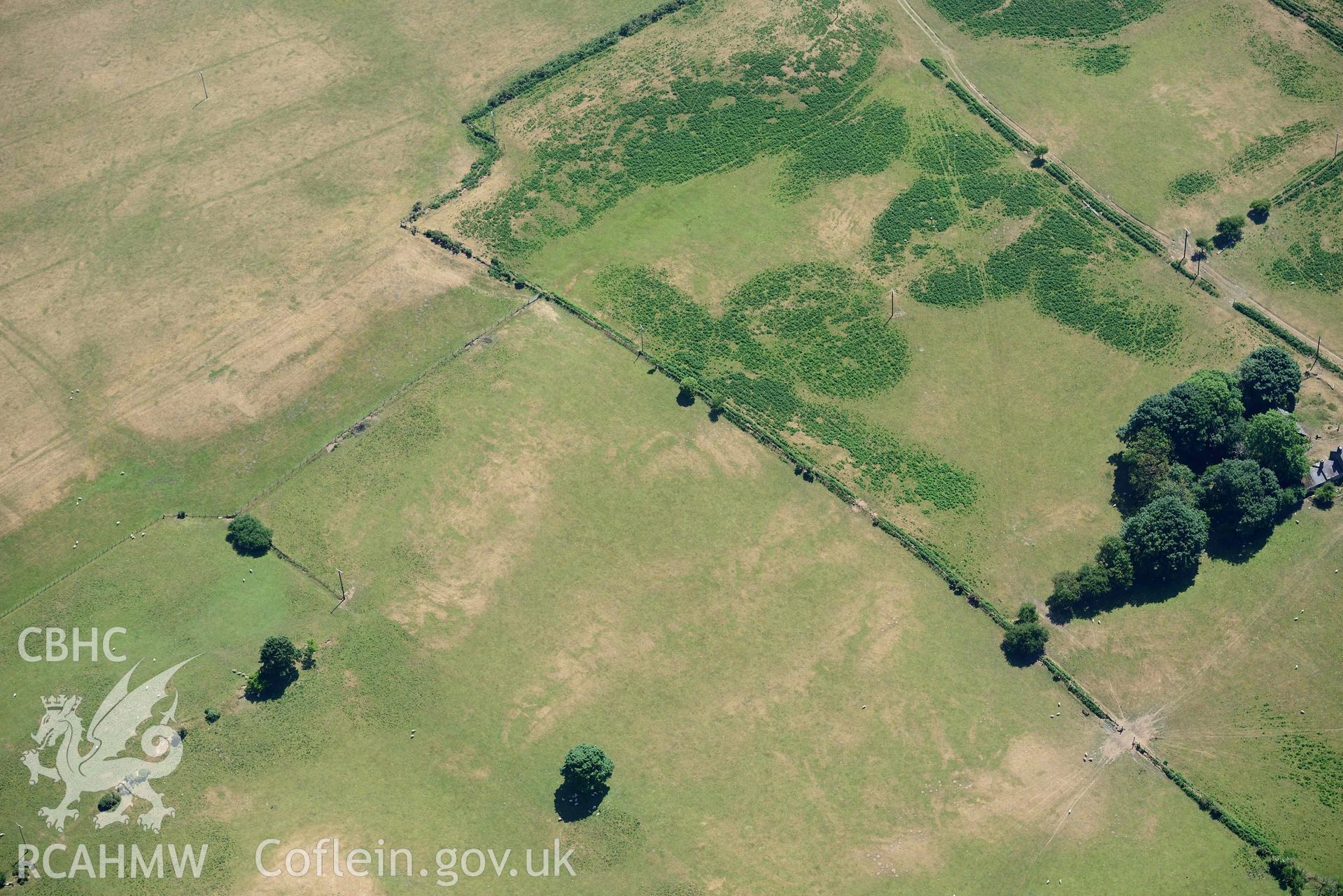 Aerial photograph: Traian, rectangular defended enclosure and field systems. Crown: CHERISH PROJECT 2018. Produced with EU funds through the Ireland Wales Co-operation Programme 2014-2020 (NGR SH329363)