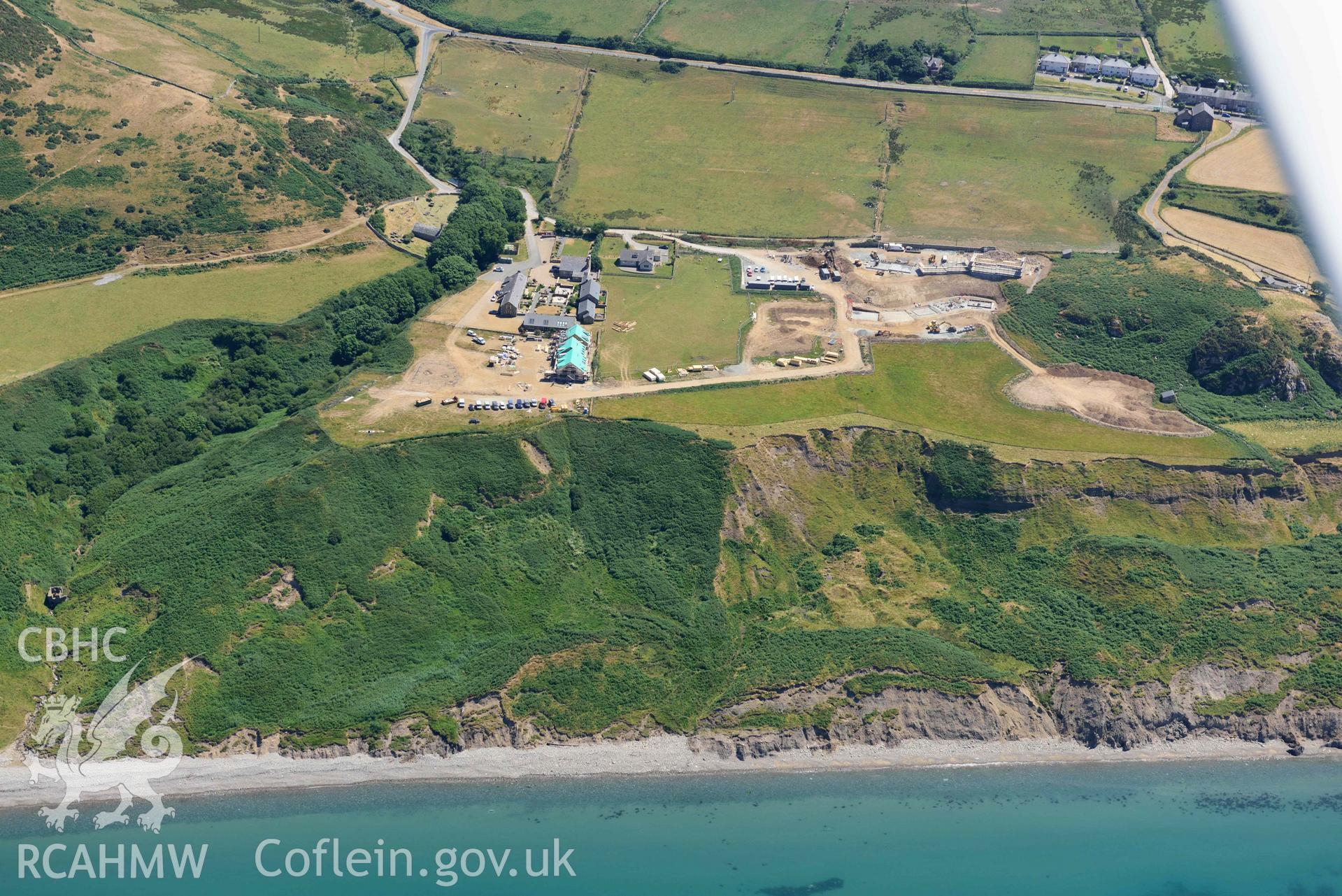 Aerial photograph: Pistyll Far and Plas Pistyll, new housing above eroding cliffs. Crown: CHERISH PROJECT 2018. Produced with EU funds through the Ireland Wales Co-operation Programme 2014-2020 (NGR SH326422)