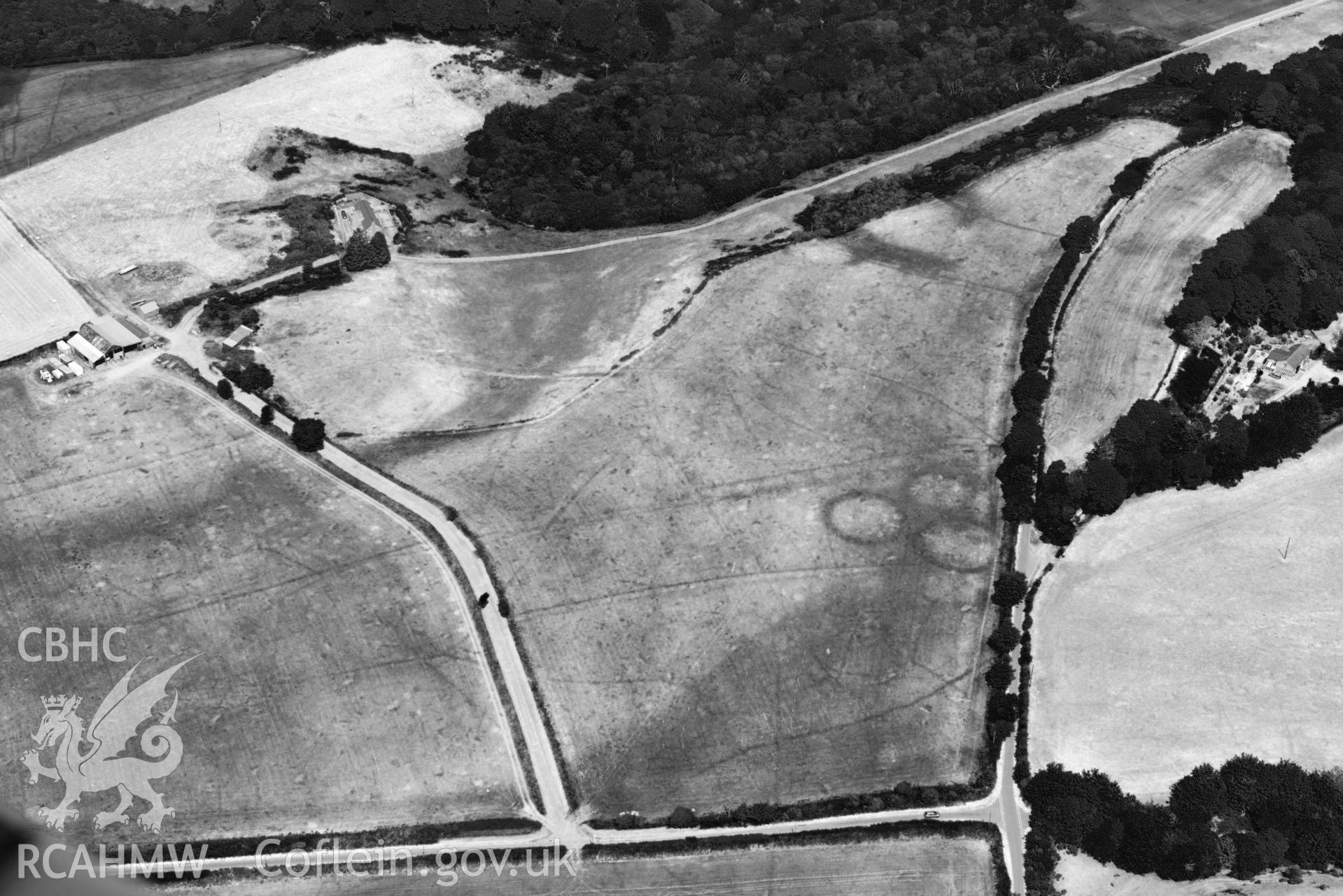 Aerial photograph: Bryn Bodfel ring ditches and field systems, view from south. Crown: CHERISH PROJECT 2018. Produced with EU funds through the Ireland Wales Co-operation Programme 2014-2020 (NGR SH335361)