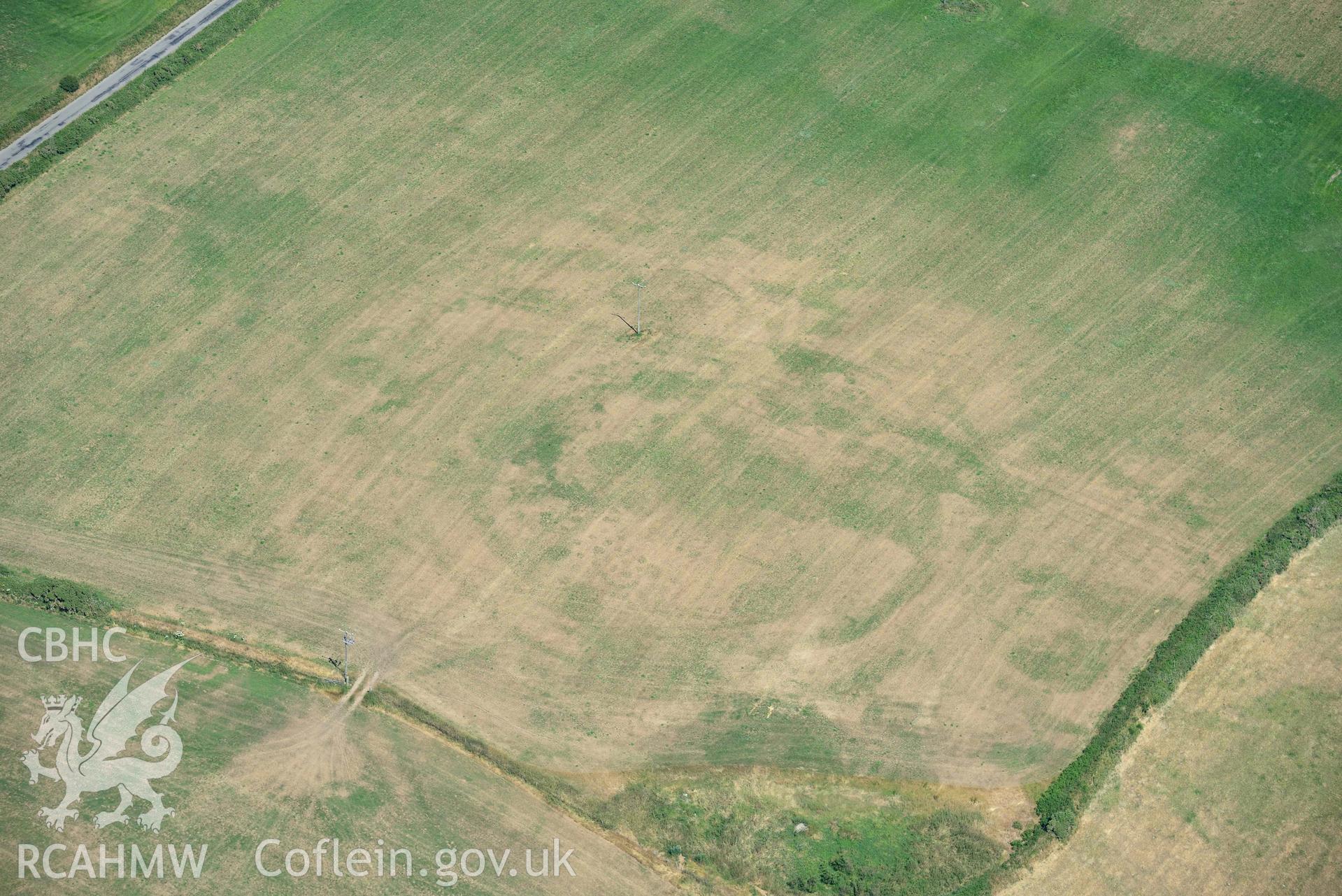 Aerial photograph: Bryniau or Bryn Rhydd cropmark enclosure. Crown: CHERISH PROJECT 2018. Produced with EU funds through the Ireland Wales Co-operation Programme 2014-2020 (NGR SH265387)