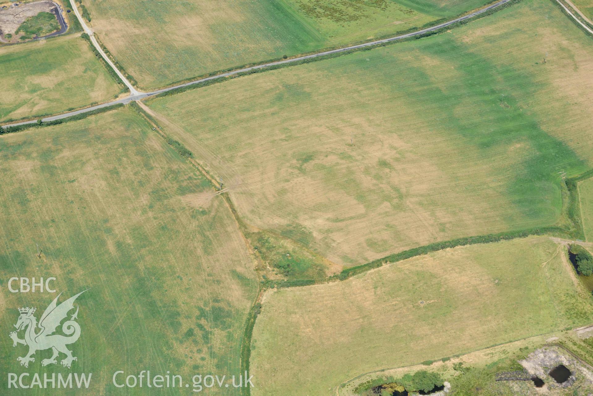 Aerial photograph: Bryniau or Bryn Rhydd cropmark enclosure. Crown: CHERISH PROJECT 2018. Produced with EU funds through the Ireland Wales Co-operation Programme 2014-2020 (NGR SH265387)