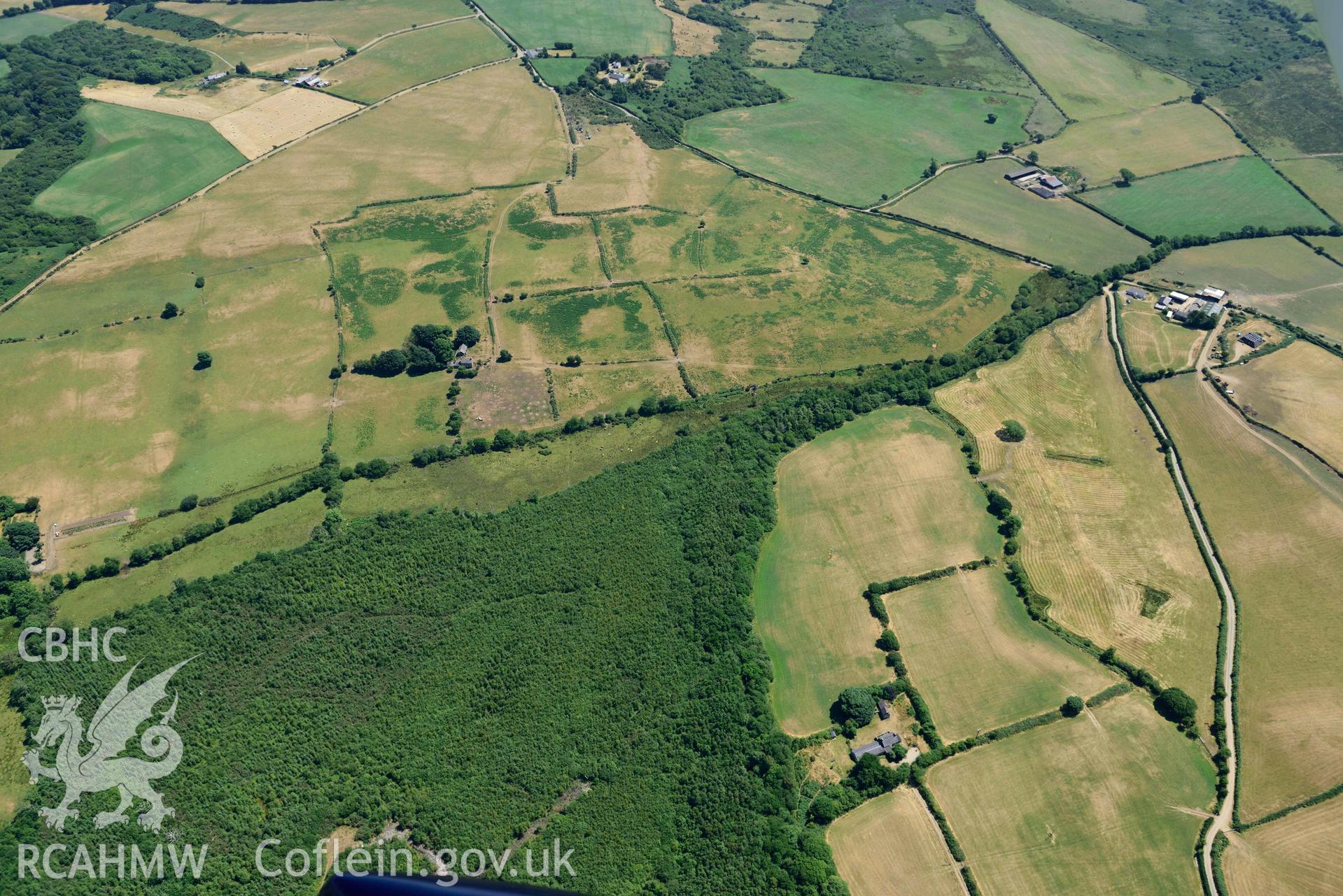 Aerial photograph: Ceidio Bach, cropmarks of double linear ditches. Crown: CHERISH PROJECT 2018. Produced with EU funds through the Ireland Wales Co-operation Programme 2014-2020 (NGR SH288373)