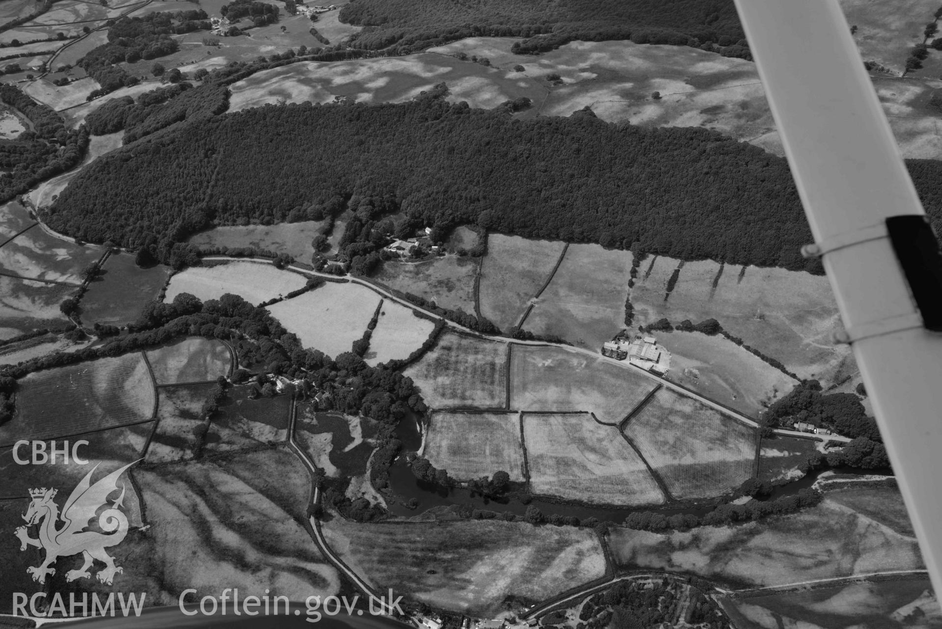 Aerial photograph: Dol-gamlyn, cropmarks of curving linear ditch of uncertain date. Crown: CHERISH PROJECT 2018. Produced with EU funds through the Ireland Wales Co-operation Programme 2014-2020 (NGR SN678789)