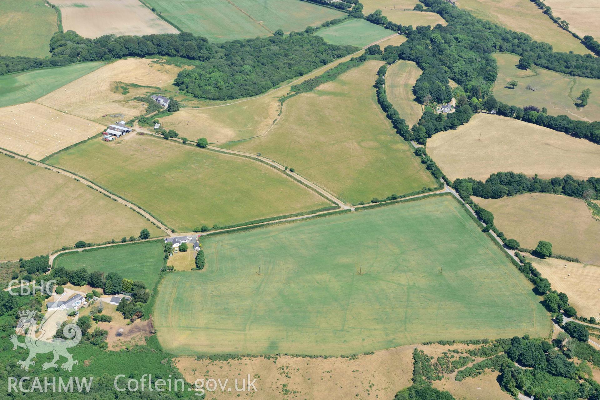 Aerial photograph: Bryn Bodfel ring ditches and field systems, view from south. Crown: CHERISH PROJECT 2018. Produced with EU funds through the Ireland Wales Co-operation Programme 2014-2020 (NGR SH335361)