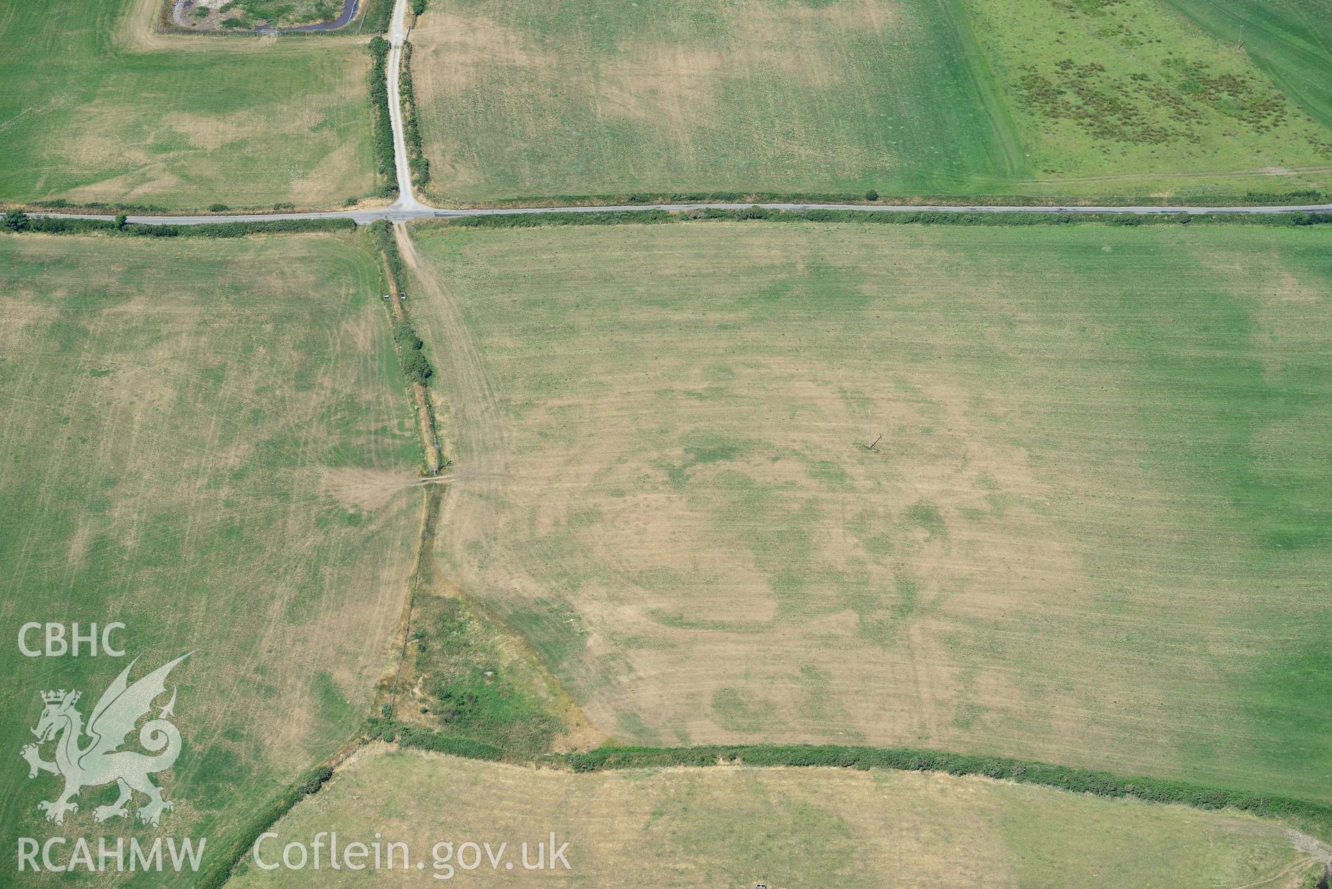 Aerial photograph: Bryniau or Bryn Rhydd cropmark enclosure. Crown: CHERISH PROJECT 2018. Produced with EU funds through the Ireland Wales Co-operation Programme 2014-2020 (NGR SH265387)