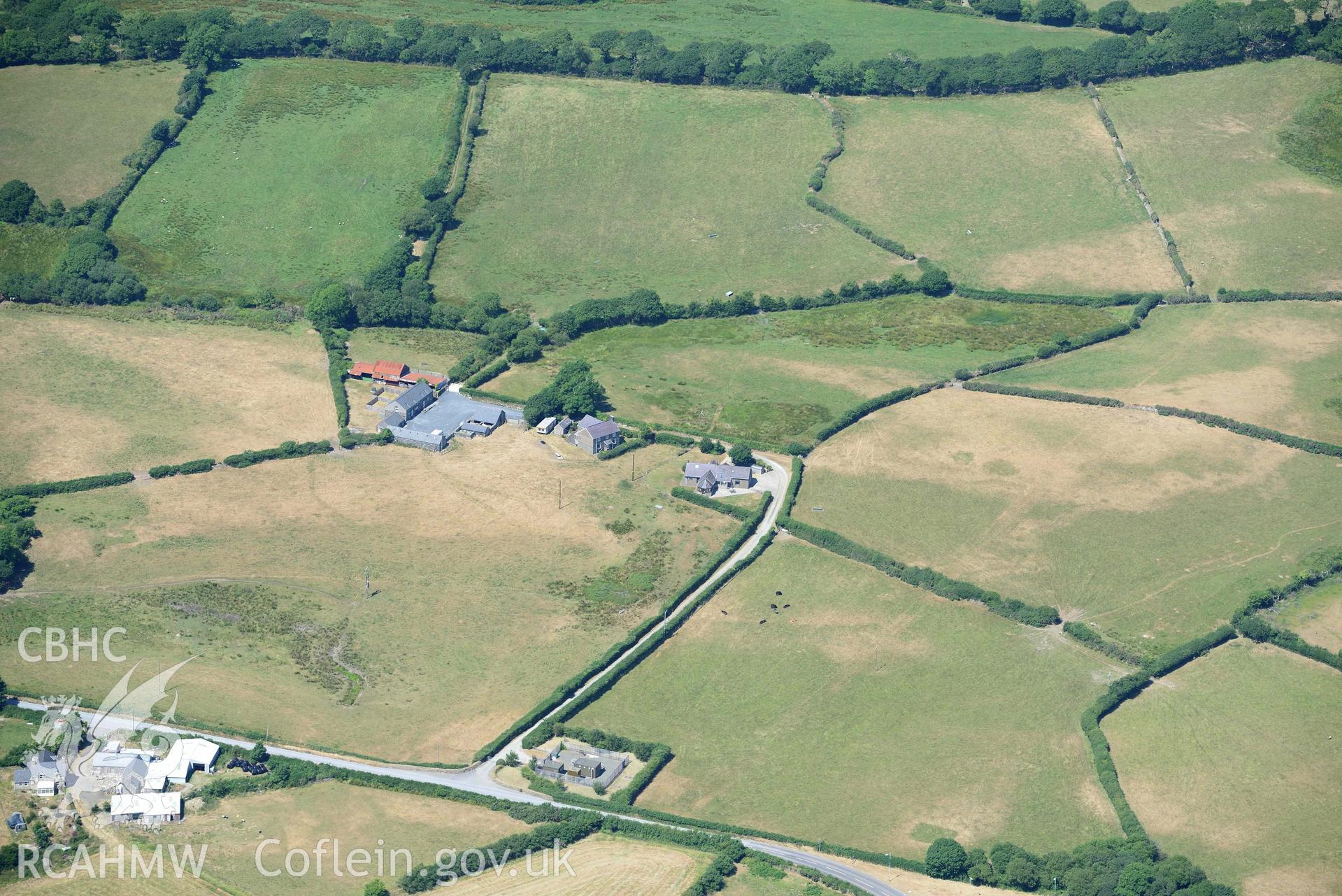 Aerial photograph: Bryn-Marsli cropmark enclosure from south. Crown: CHERISH PROJECT 2018. Produced with EU funds through the Ireland Wales Co-operation Programme 2014-2020 (NGR SH449380)