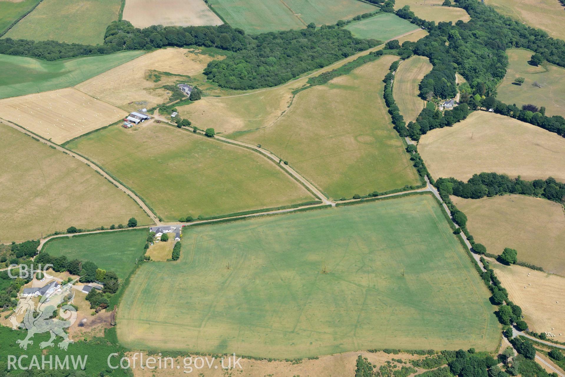 Aerial photograph: Traian, rectangular defended enclosure and field systems. Crown: CHERISH PROJECT 2018. Produced with EU funds through the Ireland Wales Co-operation Programme 2014-2020 (NGR SH329363)