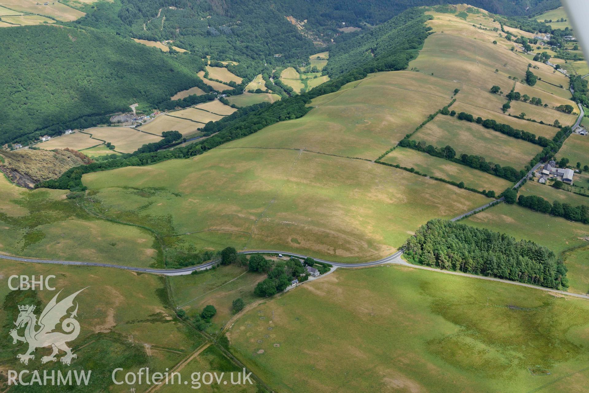 Aerial photograph: Bwlch-y-Crwys round barrow, with parchmarks. Crown: CHERISH PROJECT 2018. Produced with EU funds through the Ireland Wales Co-operation Programme 2014-2020 (NGR SN710776)