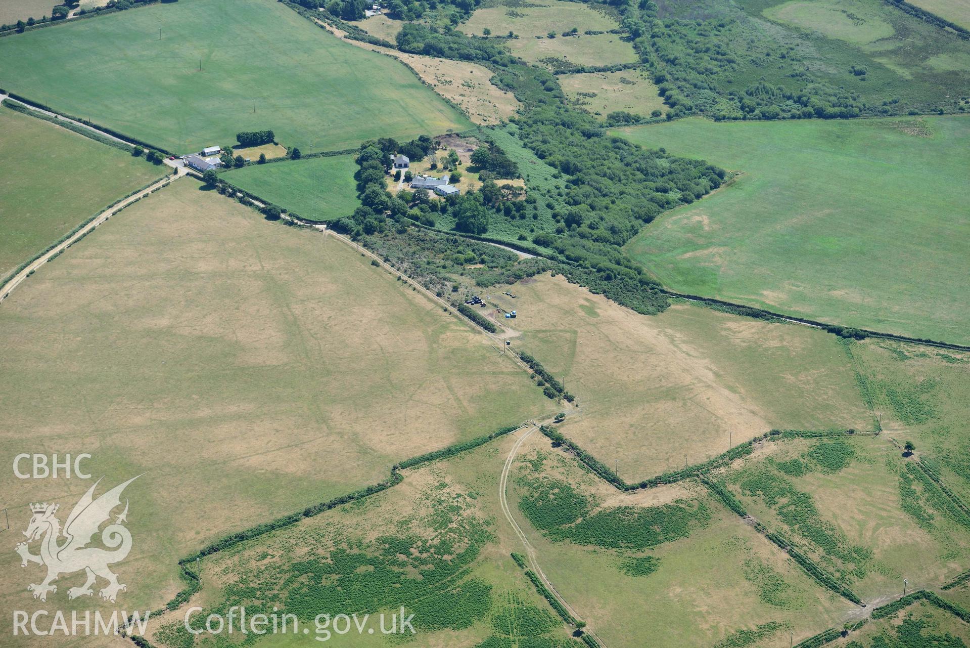 Aerial photograph: Bryn Bodfel ring ditches and field systems, view from south. Crown: CHERISH PROJECT 2018. Produced with EU funds through the Ireland Wales Co-operation Programme 2014-2020 (NGR SH335361)