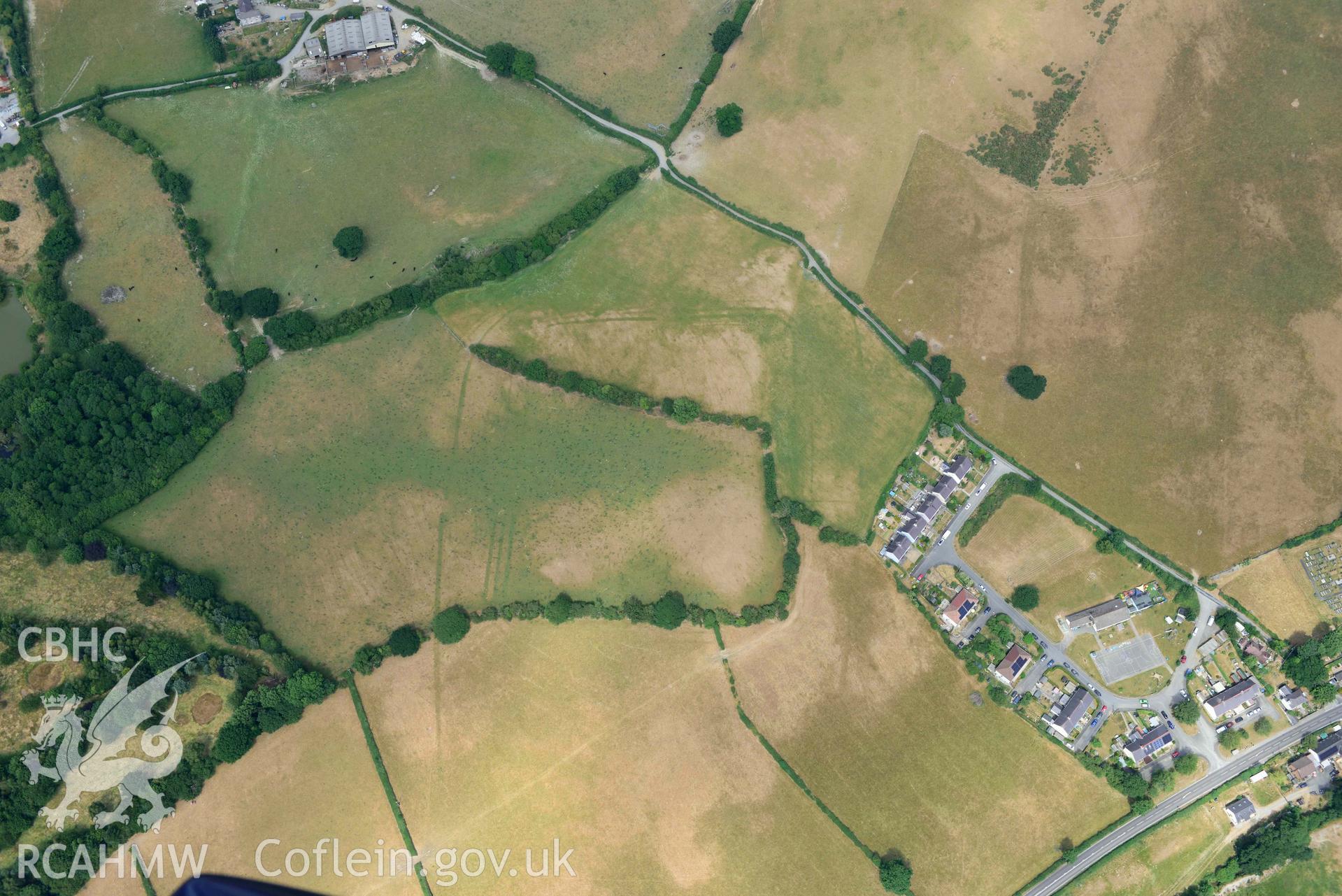 Aerial photograph: Pen-Llwyn Roman fort, with parchmarks. Crown: CHERISH PROJECT 2018. Produced with EU funds through the Ireland Wales Co-operation Programme 2014-2020 (NGR SN650806)