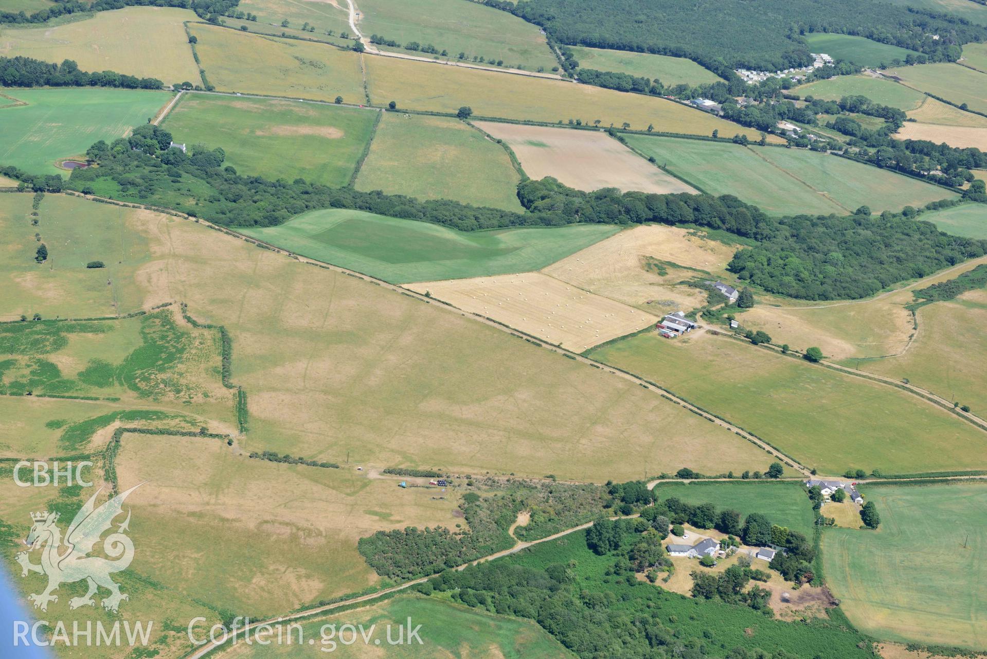 Aerial photograph: Traian, rectangular defended enclosure and field systems. Crown: CHERISH PROJECT 2018. Produced with EU funds through the Ireland Wales Co-operation Programme 2014-2020 (NGR SH329363)