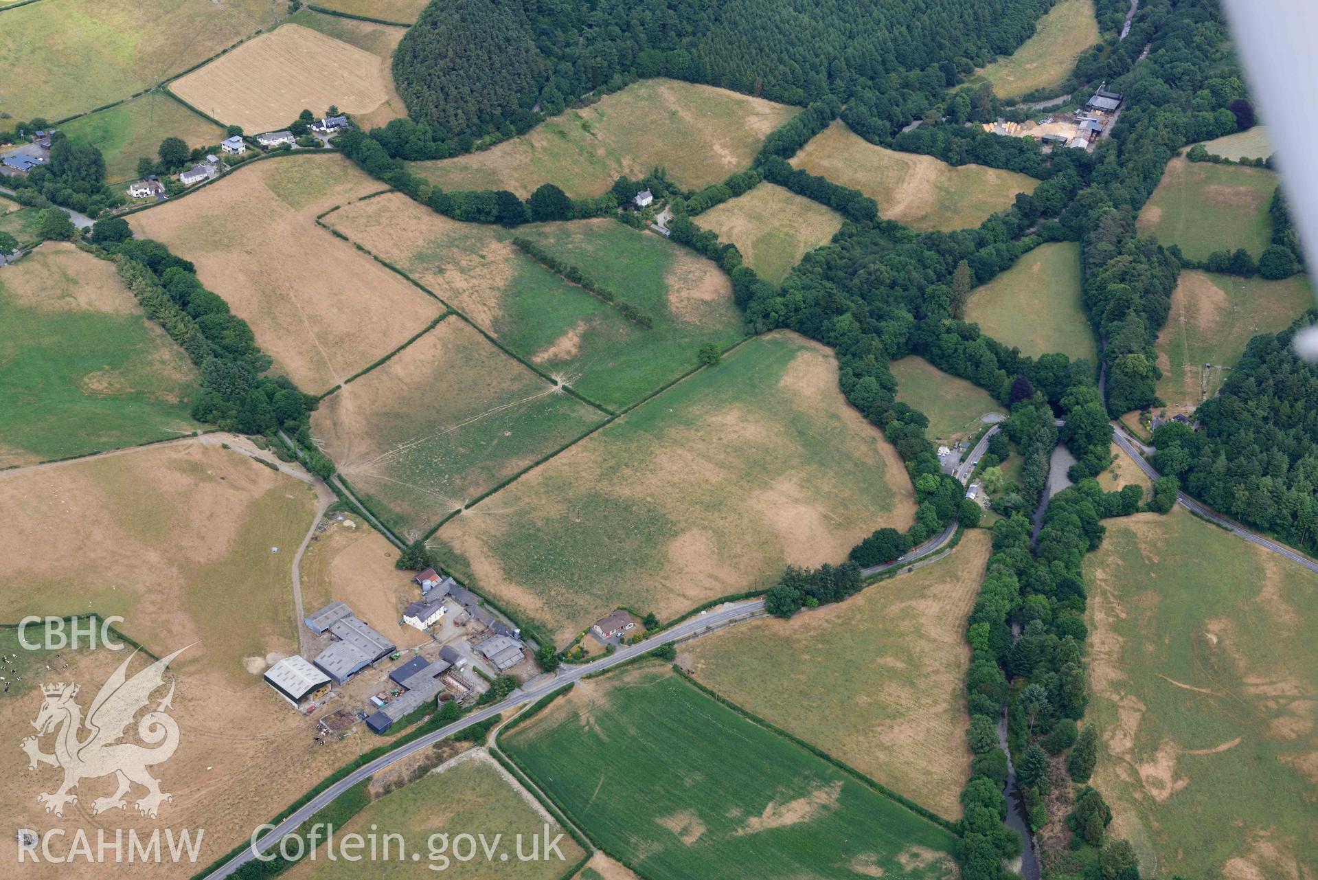 Aerial photograph: Pont Llanafan (west), various cropmarks. Crown: CHERISH PROJECT 2018. Produced with EU funds through the Ireland Wales Co-operation Programme 2014-2020 (NGR SN684714)