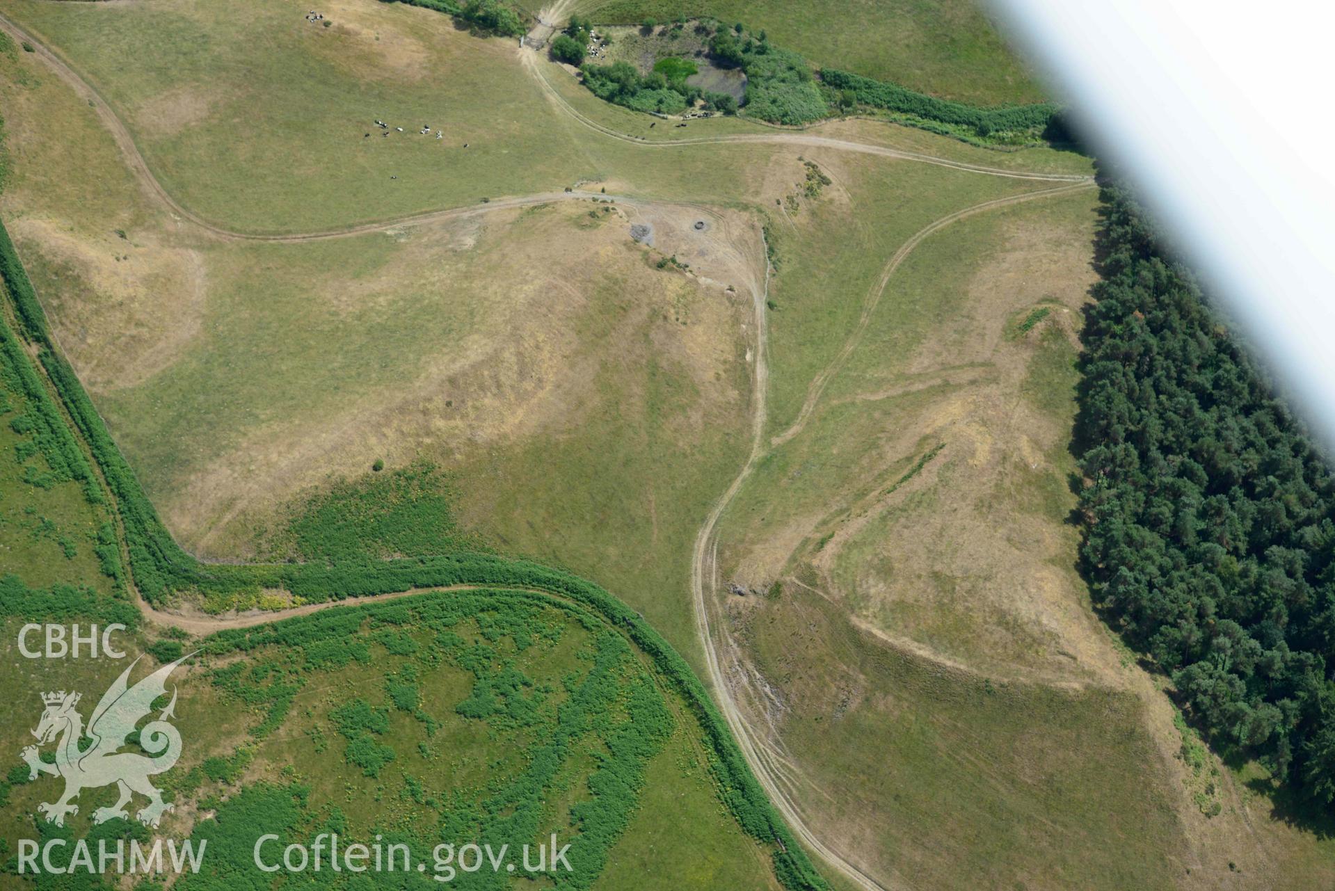 Aerial photograph: Cnwc y Bugail hillfort, with parchmarks. Crown: CHERISH PROJECT 2018. Produced with EU funds through the Ireland Wales Co-operation Programme 2014-2020 (NGR SN687740)