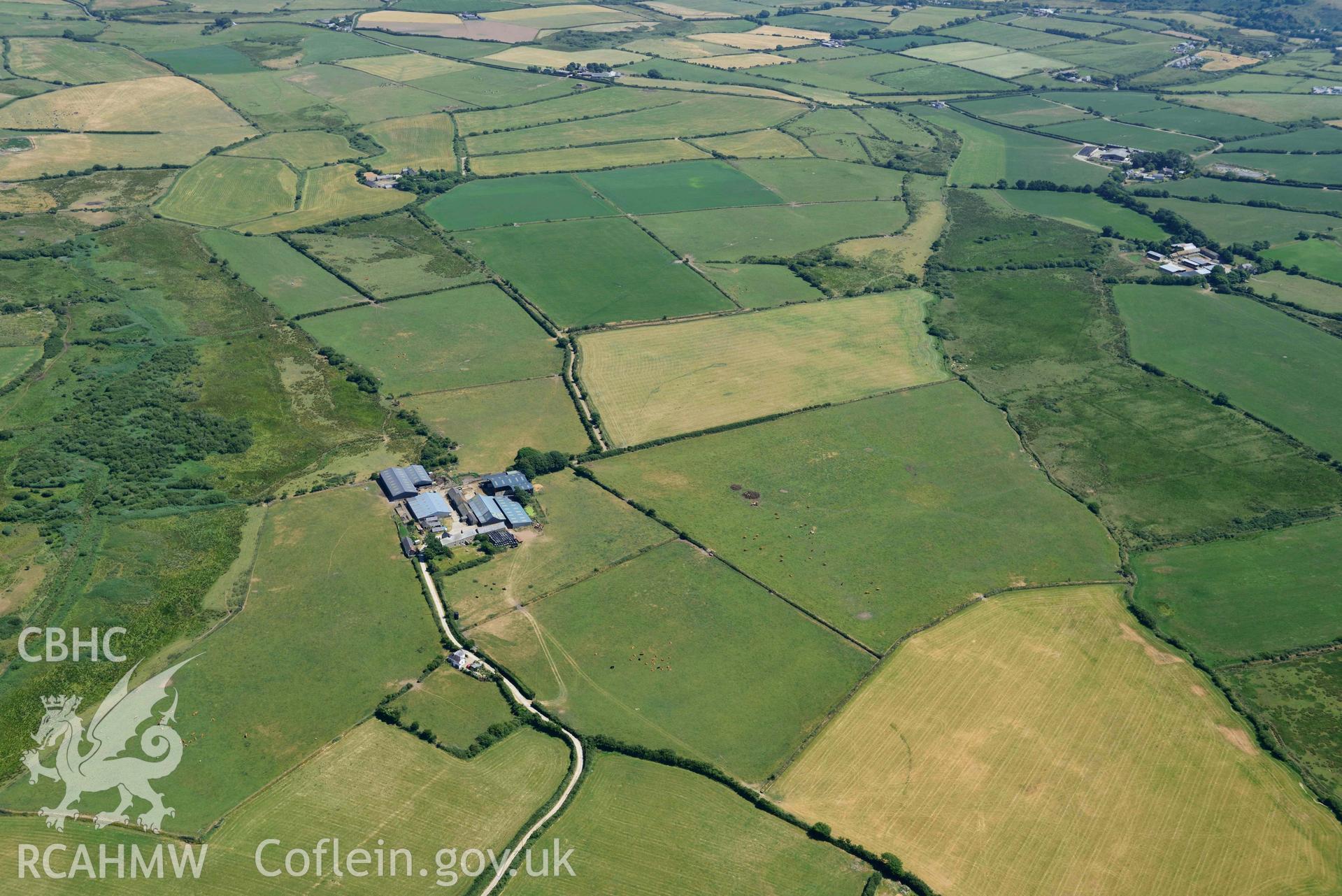 Aerial photograph: Cropmark enclosure at Hirdre Uchaf. Crown: CHERISH PROJECT 2018. Produced with EU funds through the Ireland Wales Co-operation Programme 2014-2020 (NGR SH255381)