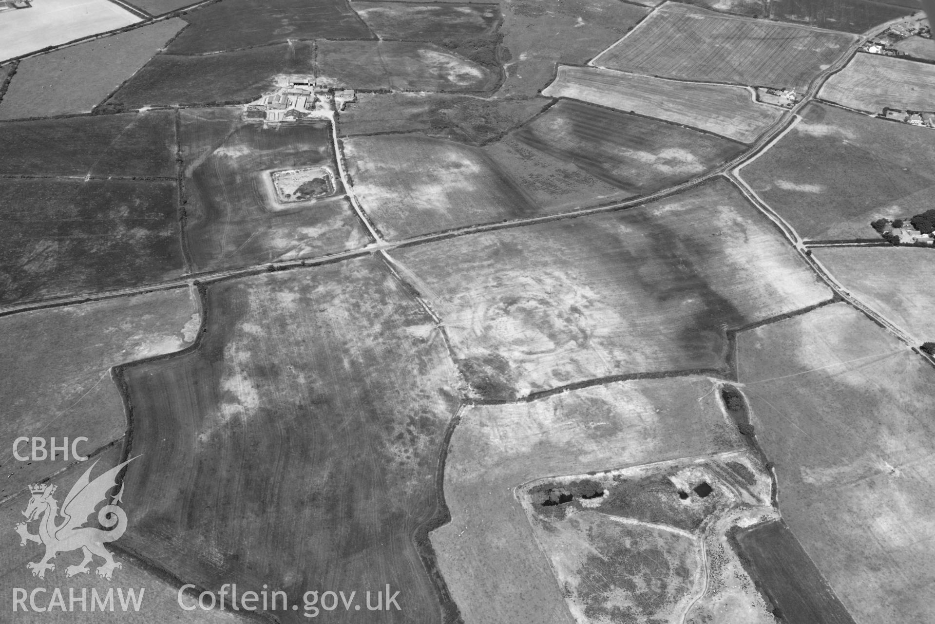 Aerial photograph: Bryniau or Bryn Rhydd cropmark enclosure. Crown: CHERISH PROJECT 2018. Produced with EU funds through the Ireland Wales Co-operation Programme 2014-2020 (NGR SH265387)