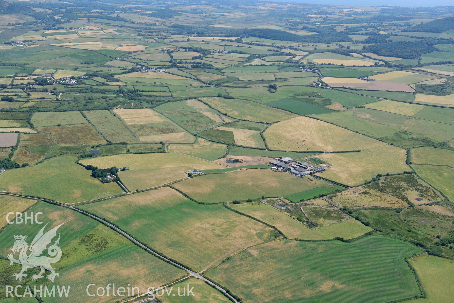 Aerial photograph: Bryniau or Bryn Rhydd cropmark enclosure. Crown: CHERISH PROJECT 2018. Produced with EU funds through the Ireland Wales Co-operation Programme 2014-2020 (NGR SH265387)