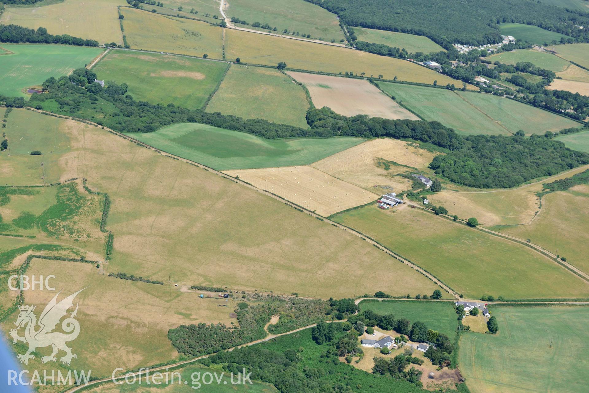 Aerial photograph: Traian, rectangular defended enclosure and field systems. Crown: CHERISH PROJECT 2018. Produced with EU funds through the Ireland Wales Co-operation Programme 2014-2020 (NGR SH329363)