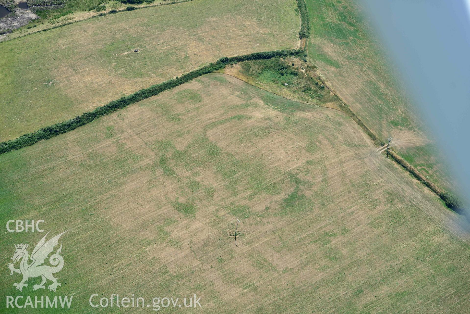 Aerial photograph: Bryniau or Bryn Rhydd cropmark enclosure. Crown: CHERISH PROJECT 2018. Produced with EU funds through the Ireland Wales Co-operation Programme 2014-2020 (NGR SH265387)