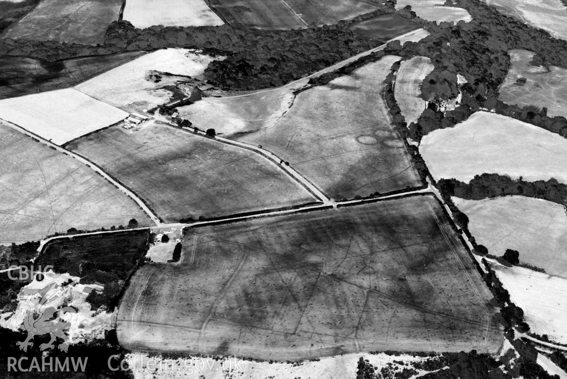 Aerial photograph: Bryn Bodfel ring ditches and field systems, view from south. Crown: CHERISH PROJECT 2018. Produced with EU funds through the Ireland Wales Co-operation Programme 2014-2020 (NGR SH335361)