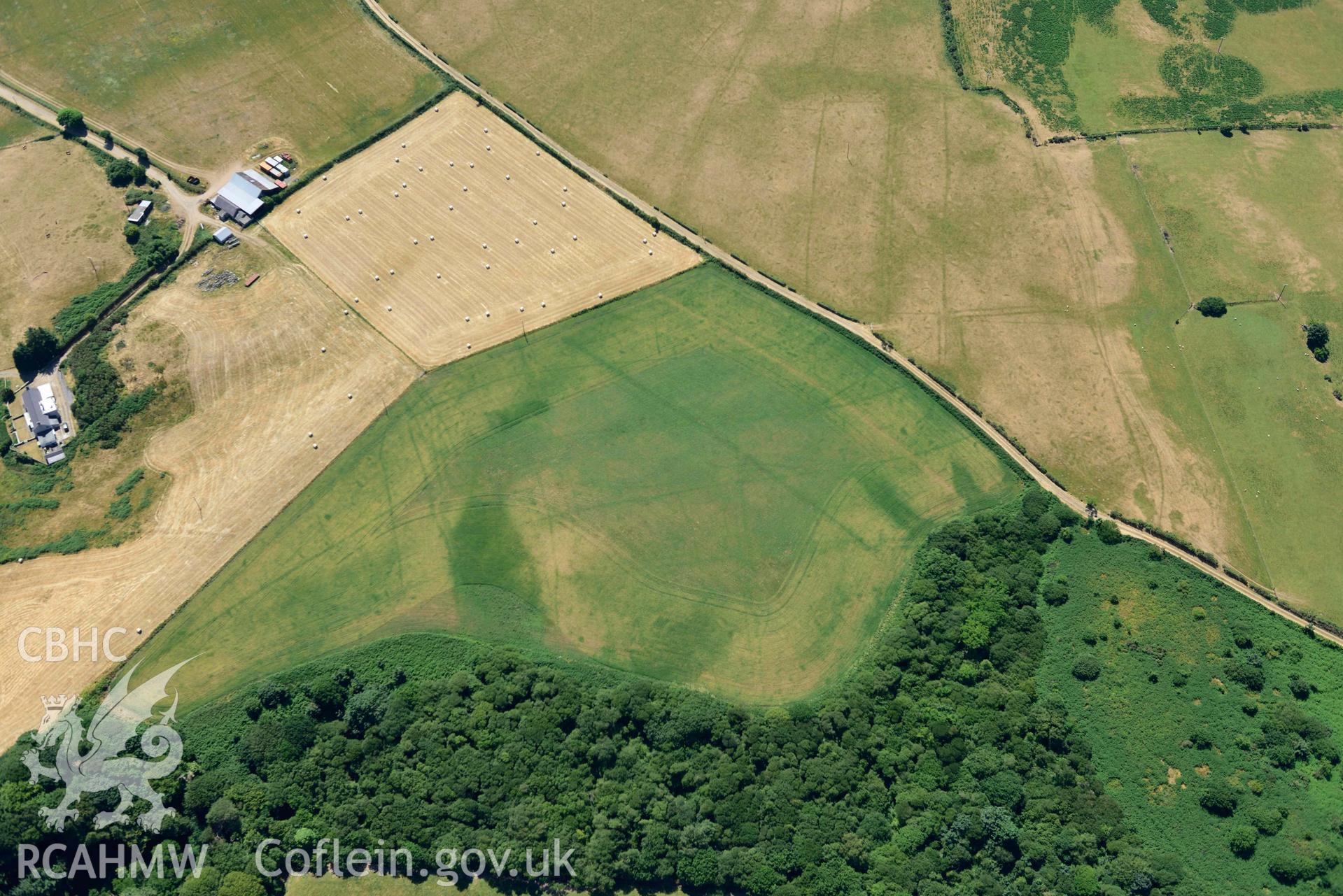 Aerial photograph: Traian bilvallate cropmark enclosure. Crown: CHERISH PROJECT 2018. Produced with EU funds through the Ireland Wales Co-operation Programme 2014-2020 (NGR SH329366)