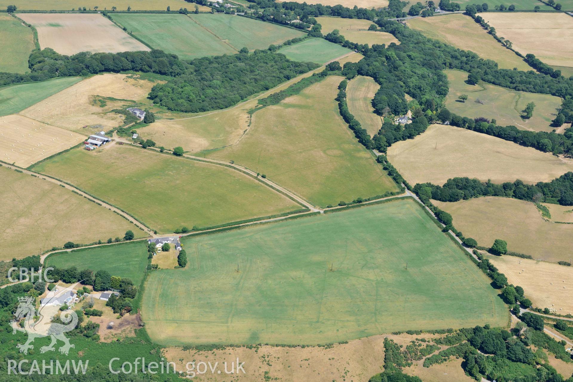 Aerial photograph: Bryn Bodfel ring ditches and field systems, view from south. Crown: CHERISH PROJECT 2018. Produced with EU funds through the Ireland Wales Co-operation Programme 2014-2020 (NGR SH335361)