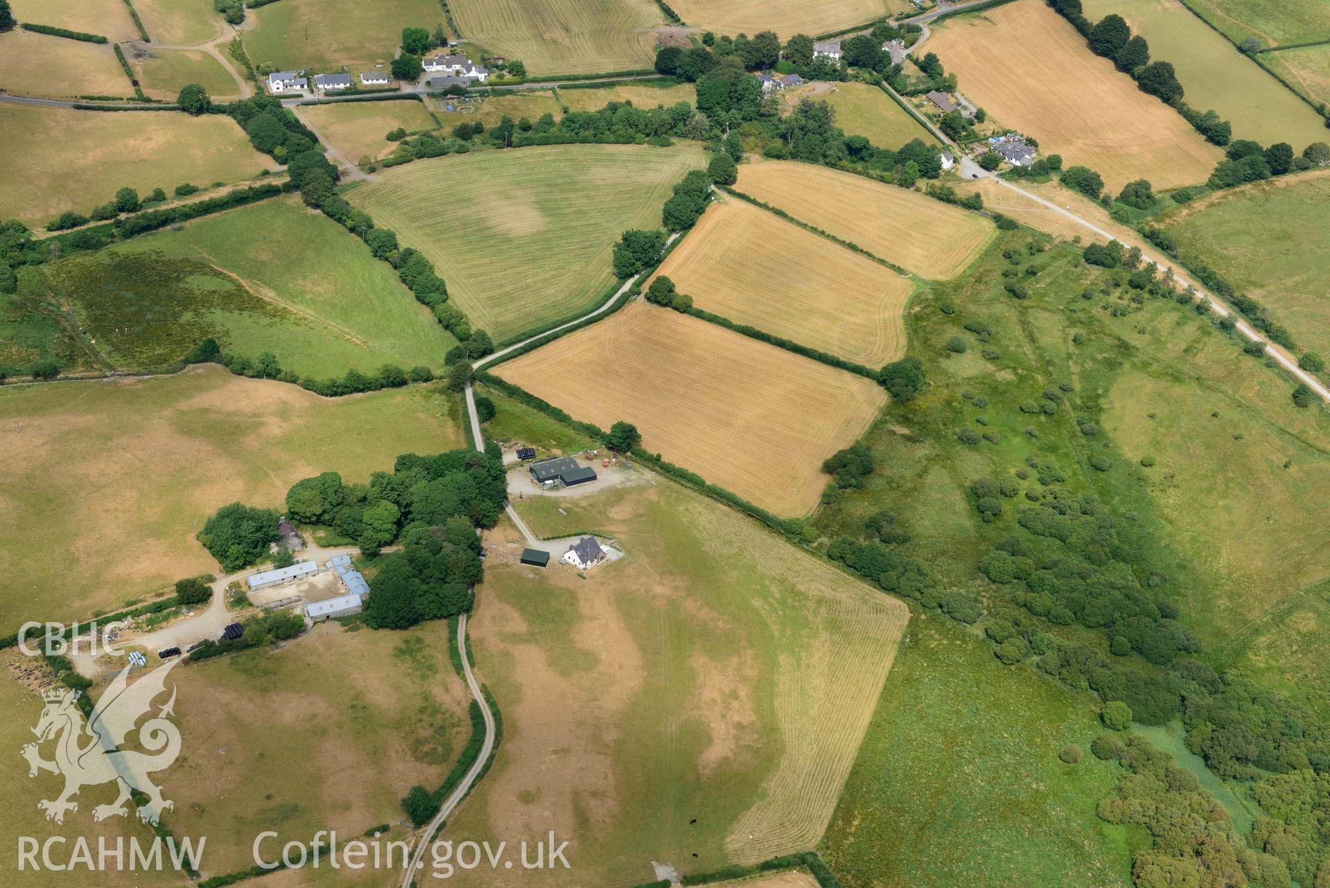 Aerial photograph: Maesbanadlog rectangular enclosure, cropmarks in field to south-east of farm. Crown: CHERISH PROJECT 2018. Produced with EU funds through the Ireland Wales Co-operation Programme 2014-2020 (NGR SN707669)