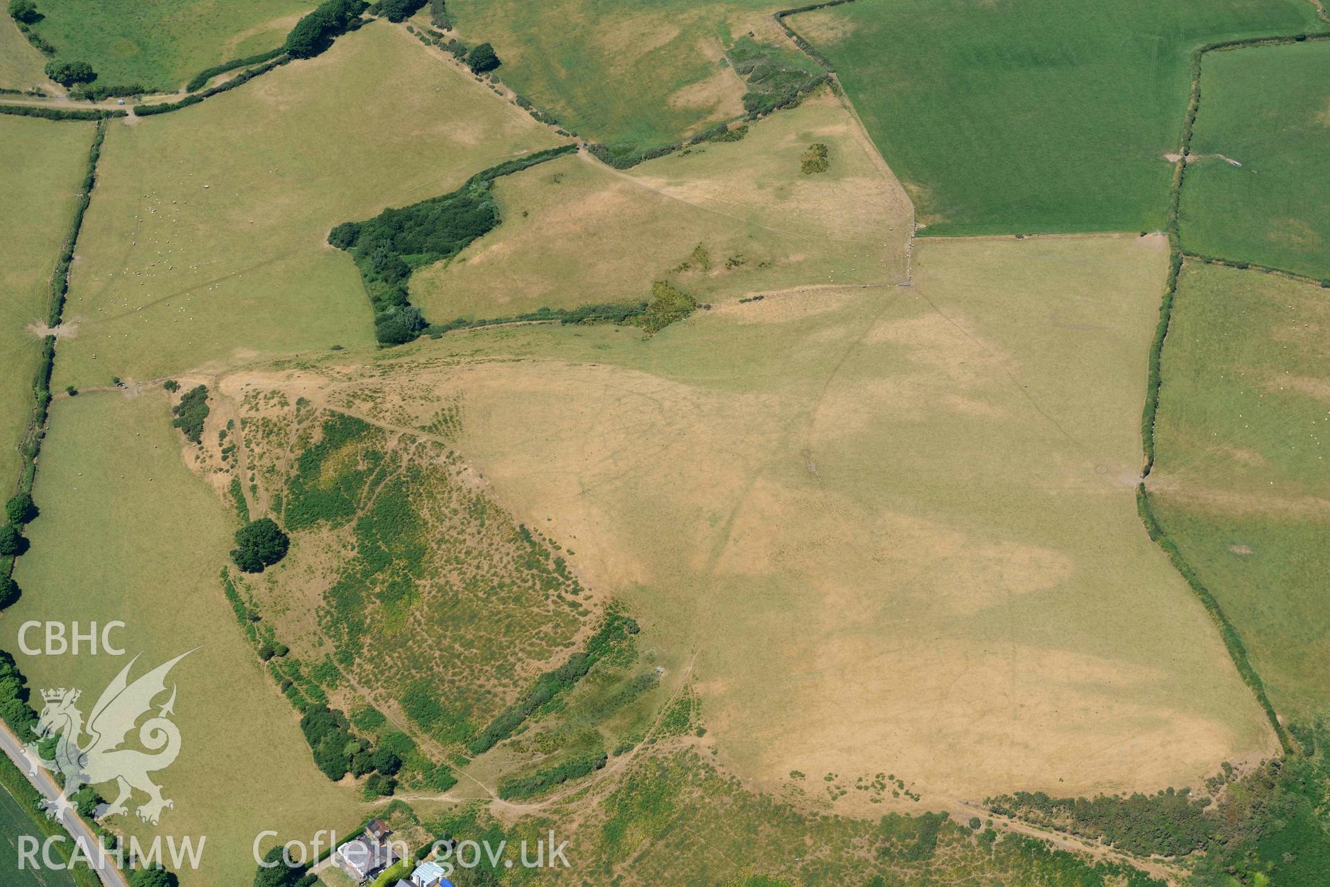 Aerial photograph: Llangian: cropmarks of early promontory enclosure, from south. Crown: CHERISH PROJECT 2018. Produced with EU funds through the Ireland Wales Co-operation Programme 2014-2020 (NGR SH294292)