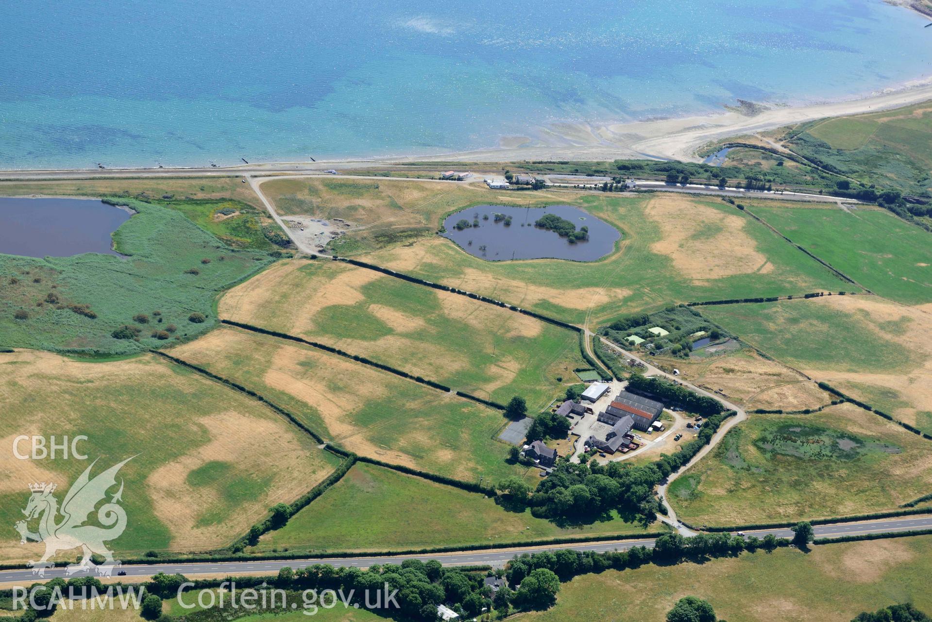 Aerial photograph: Glanllynnau early field system cropmarks, view from north. Crown: CHERISH PROJECT 2018. Produced with EU funds through the Ireland Wales Co-operation Programme 2014-2020 (NGR SH458376)