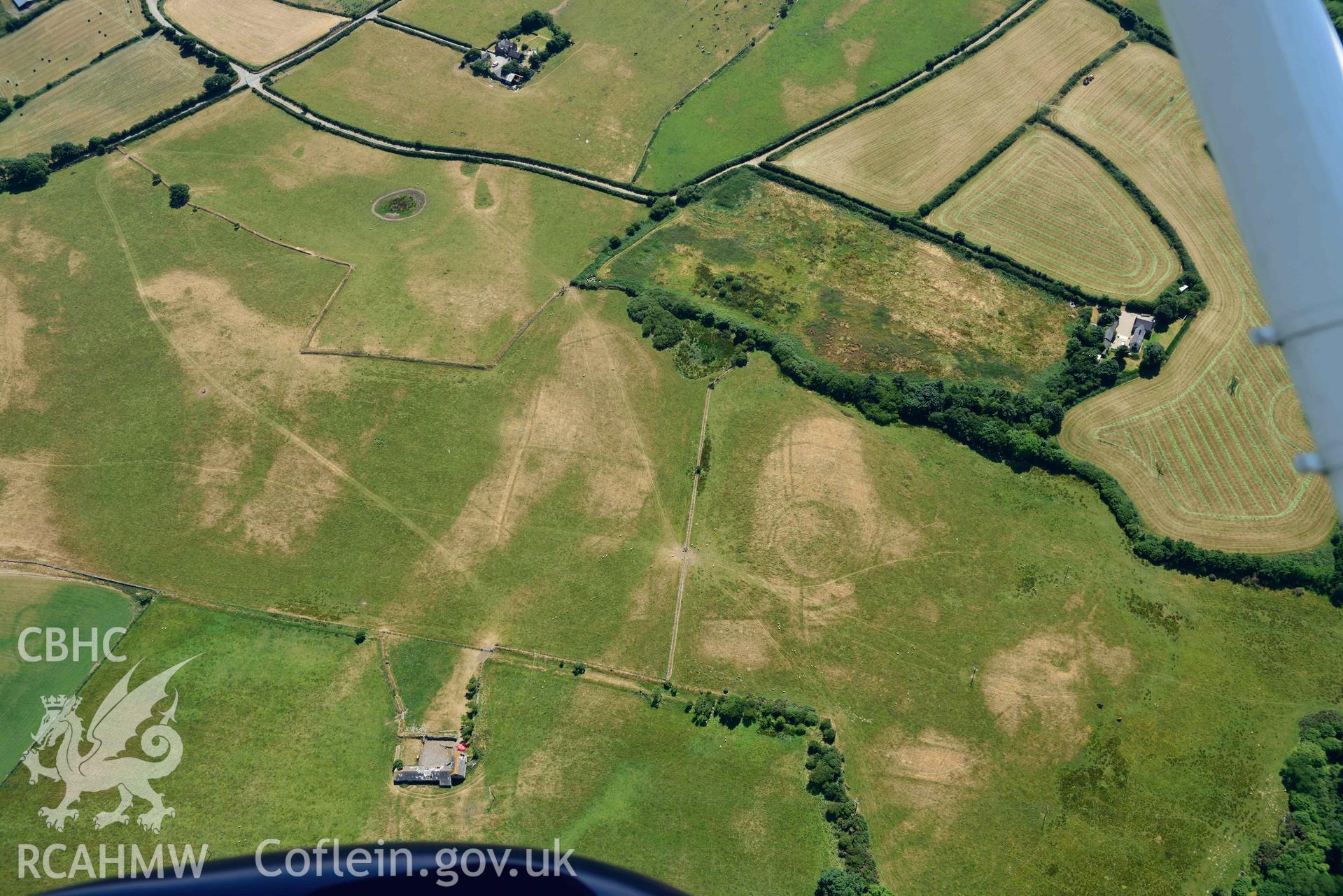 Aerial photograph: Cropmarks of Capel Gwerthyr, and relict field systems. Crown: CHERISH PROJECT 2018. Produced with EU funds through the Ireland Wales Co-operation Programme 2014-2020 (NGR SH276306)