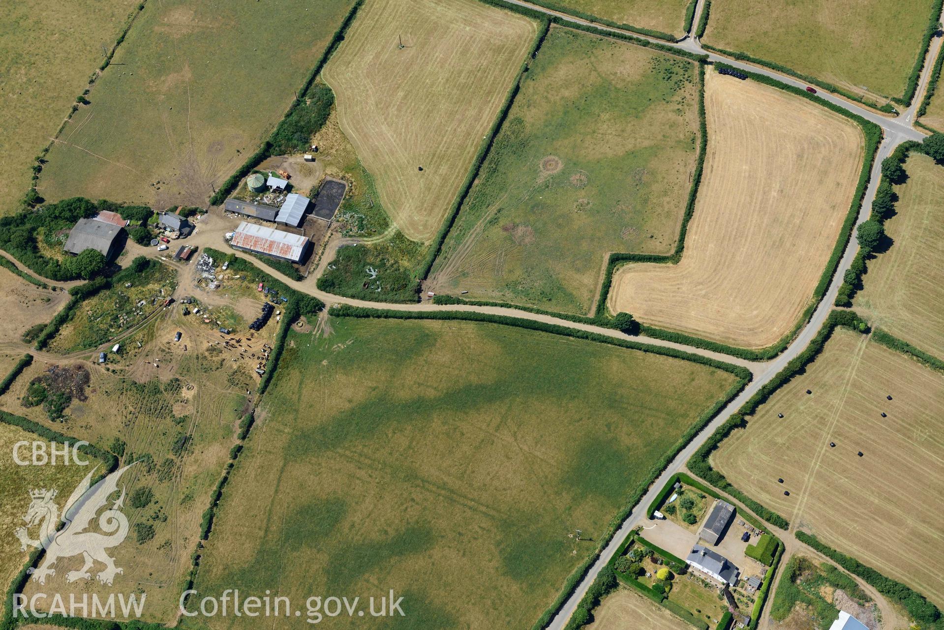 Aerial photograph: Cropmarks of Capel Gwerthyr, from south-east. Crown: CHERISH PROJECT 2018. Produced with EU funds through the Ireland Wales Co-operation Programme 2014-2020 (NGR SH276306)