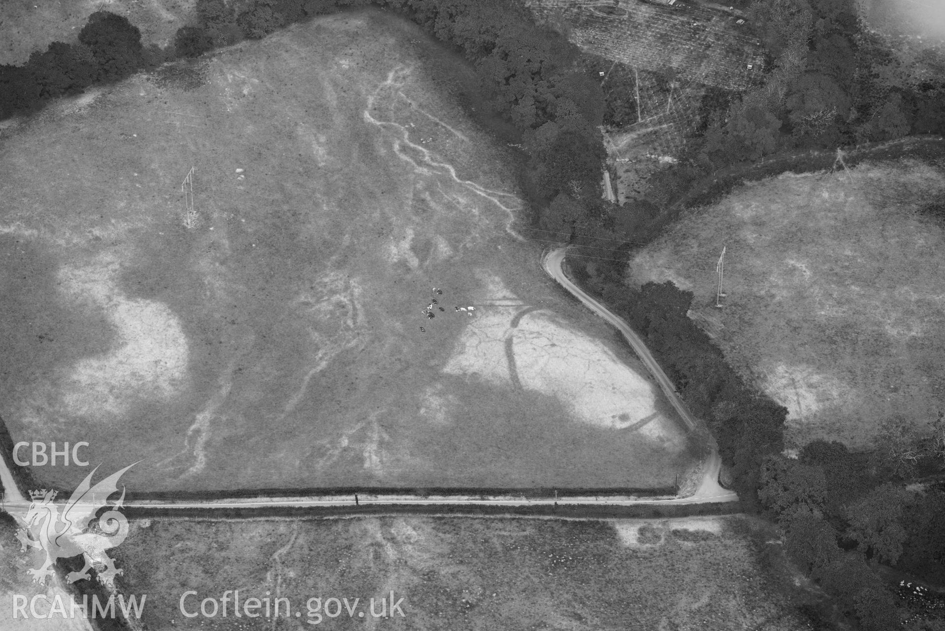 Aerial photograph: Pentre, defended enclosure cropmark. Crown: CHERISH PROJECT 2018. Produced with EU funds through the Ireland Wales Co-operation Programme 2014-2020 (NGR SN621504)