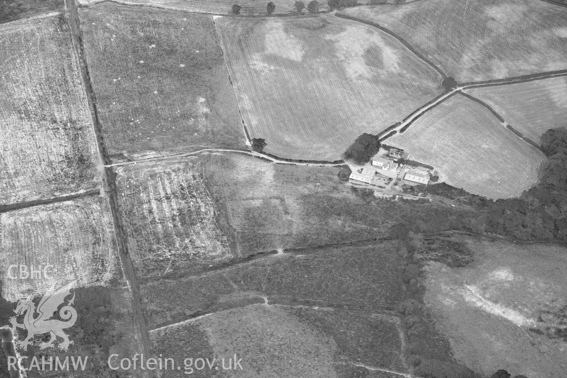 Aerial photograph: Ynyscapel defended enclosure. Crown: CHERISH PROJECT 2018. Produced with EU funds through the Ireland Wales Co-operation Programme 2014-2020 (NGR SN643905)