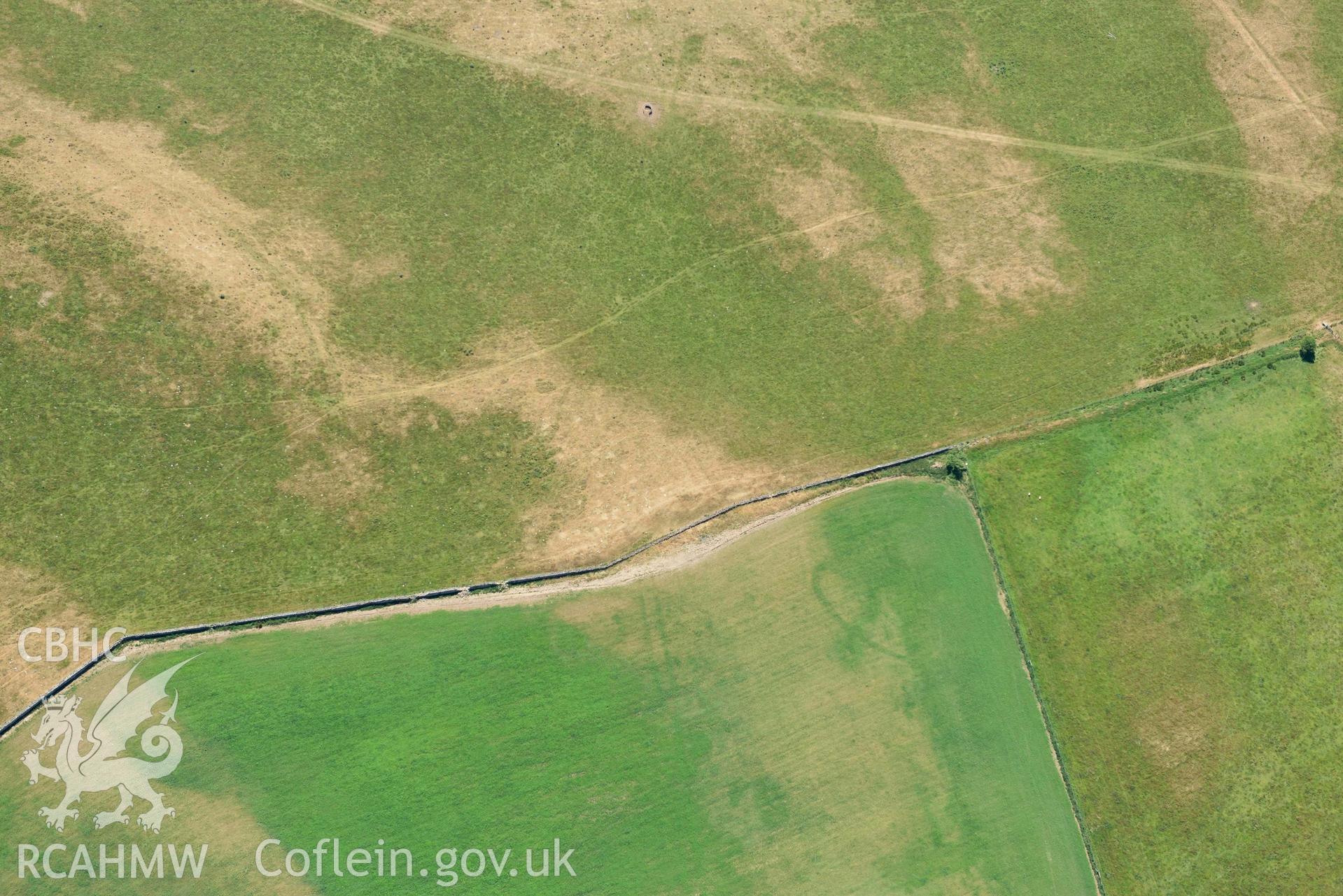 Aerial photograph: Cropmarks of Capel Gwerthyr, and relict field systems. Crown: CHERISH PROJECT 2018. Produced with EU funds through the Ireland Wales Co-operation Programme 2014-2020 (NGR SH276306)