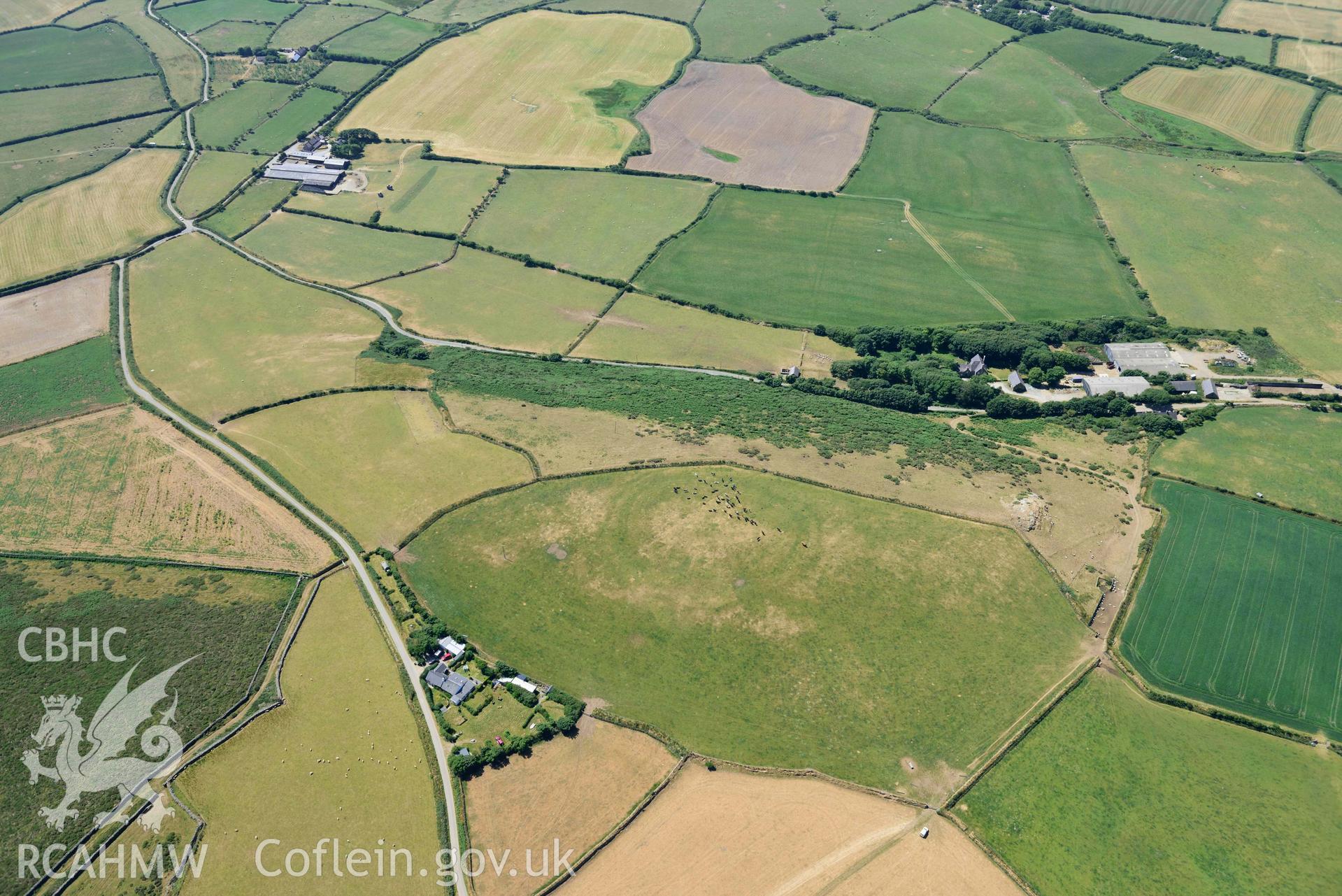 Aerial photograph: Mellionydd Enclosure, visible as a cropmark. Crown: CHERISH PROJECT 2018. Produced with EU funds through the Ireland Wales Co-operation Programme 2014-2020 (NGR SH218290)