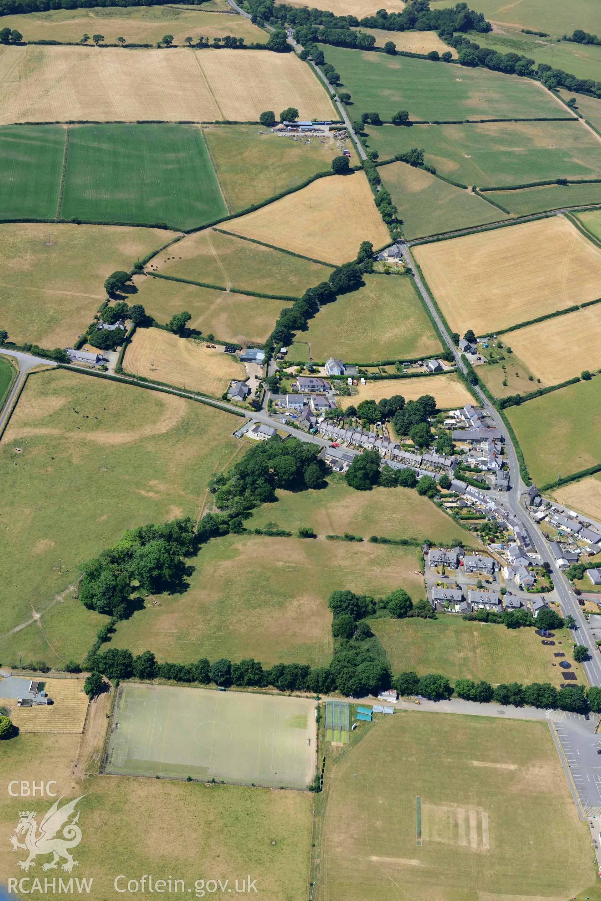 Aerial photograph: King George's Field defended enclosure, Efailnewydd. Crown: CHERISH PROJECT 2018. Produced with EU funds through the Ireland Wales Co-operation Programme 2014-2020 (NGR SH351358)