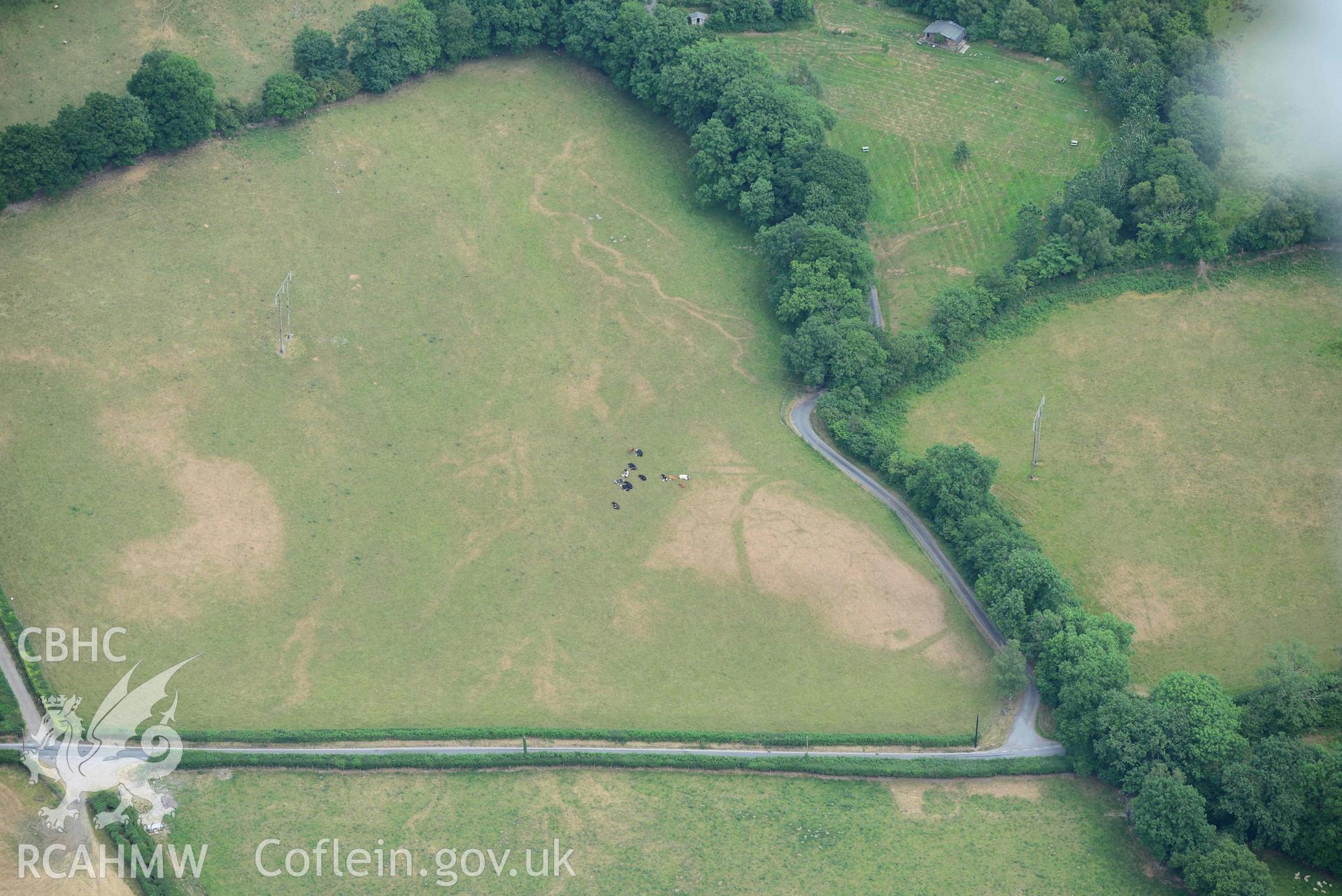 Aerial photograph: Pentre, defended enclosure cropmark. Crown: CHERISH PROJECT 2018. Produced with EU funds through the Ireland Wales Co-operation Programme 2014-2020 (NGR SN621504)