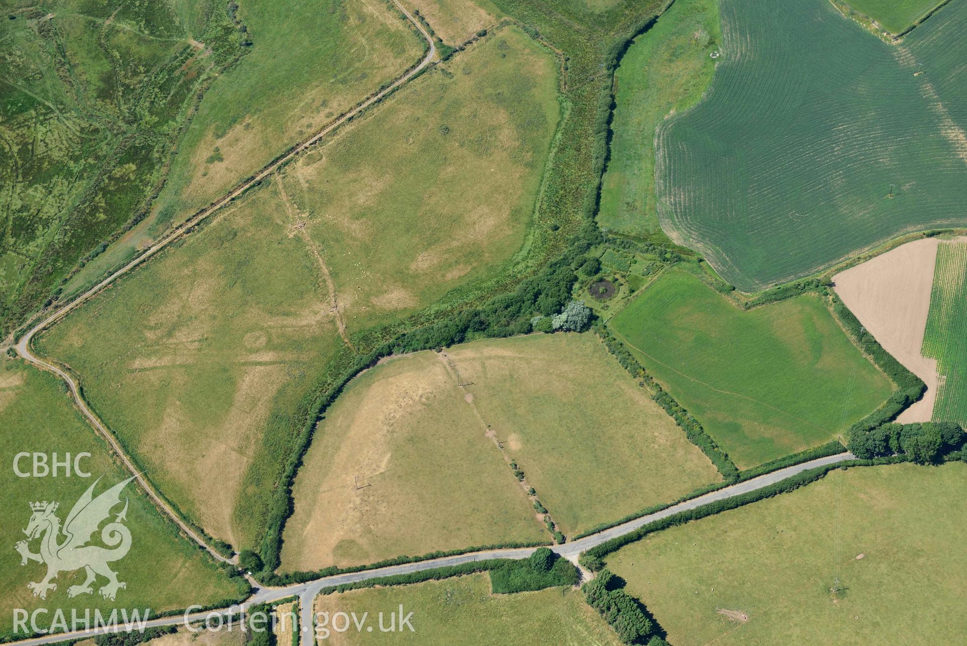 Aerial photograph: Llawr-Dref cropmark complex and barrows. Crown: CHERISH PROJECT 2018. Produced with EU funds through the Ireland Wales Co-operation Programme 2014-2020 (NGR SH291285)