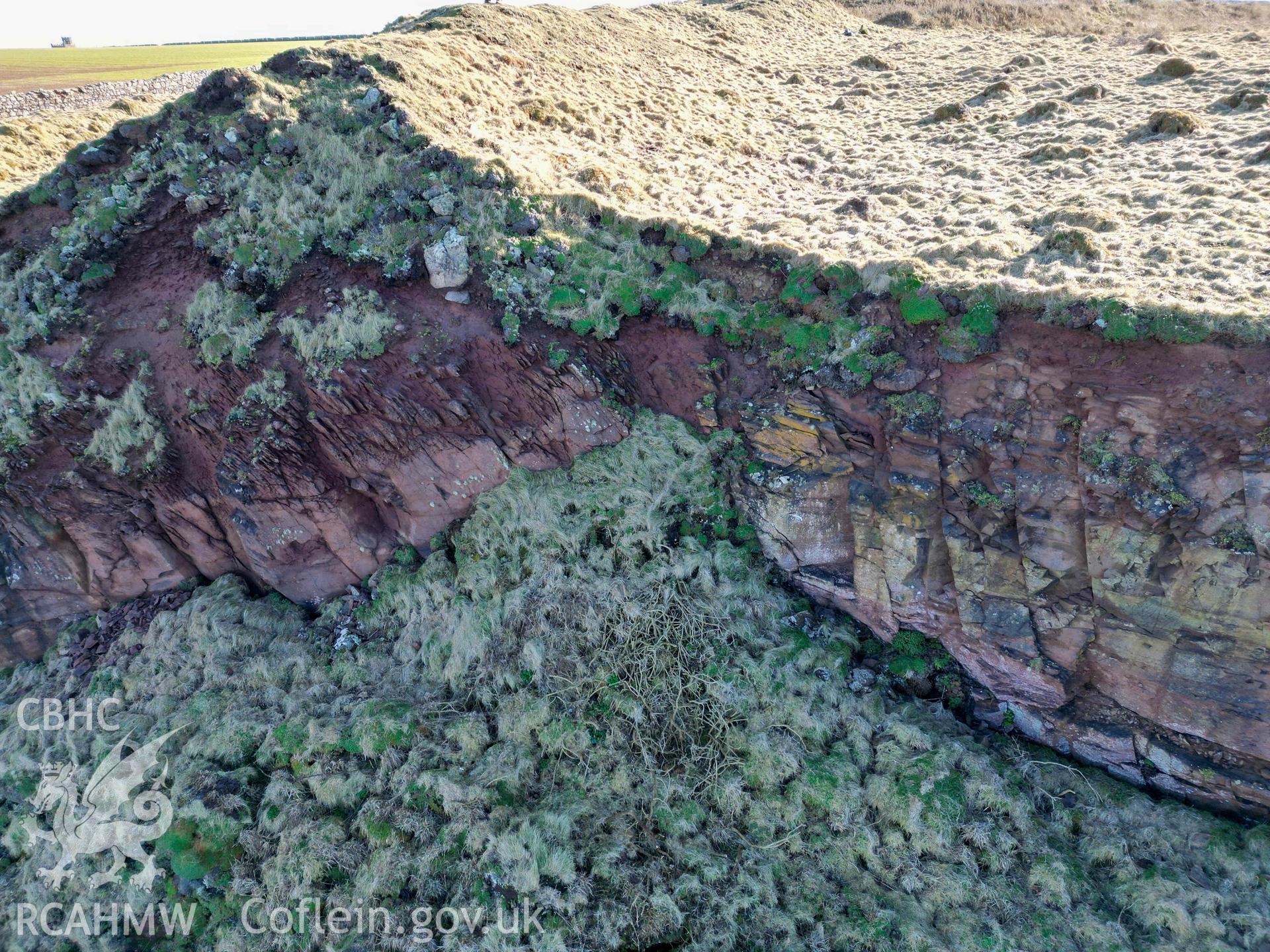 Tower Point Rath. Coastal erosion across defences at northern edge of fort.