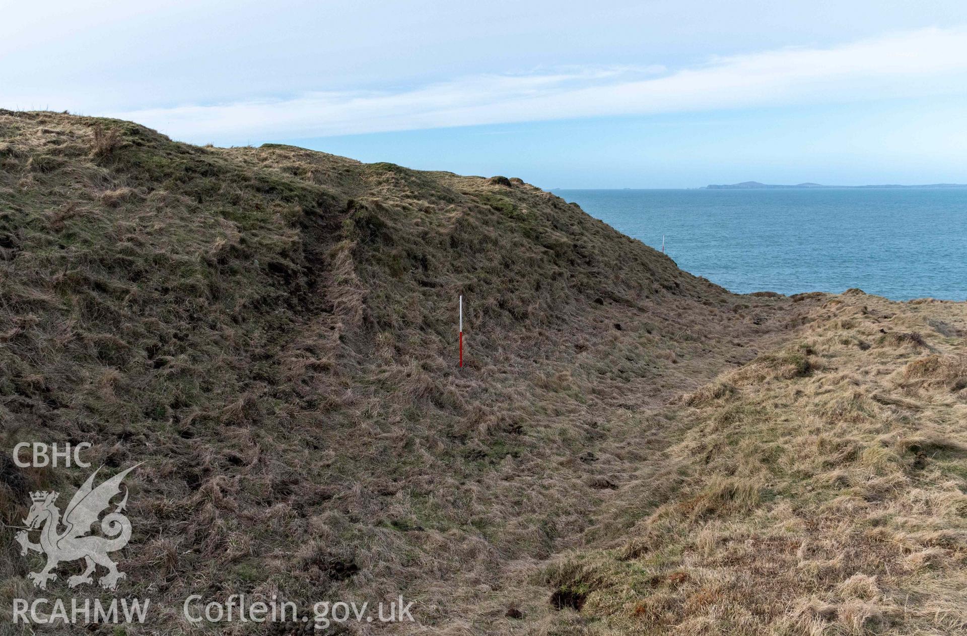 Tower Point Rath. Looking north across the inner bank and ditch to the northern edge of the fort (with scale).