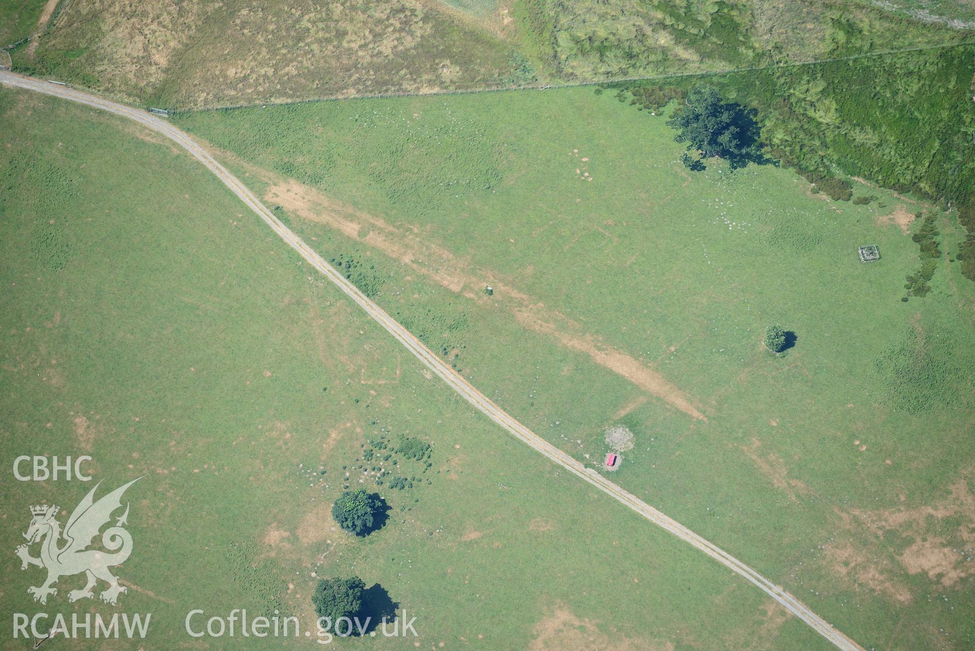 Aerial photograph: Caerhun Roman fort, with extensive parchmarks, view over vicus from east. Crown: CHERISH PROJECT 2018. Produced with EU funds through the Ireland Wales Co-operation Programme 2014-2020 (NGR: SH776703)