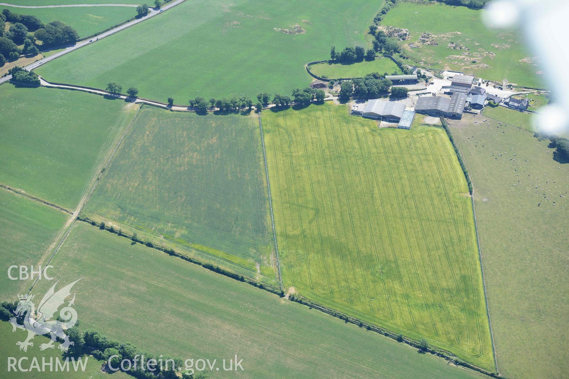 Aerial photograph: Castellior circular and rectangular cropmarks. Crown: CHERISH PROJECT 2018. Produced with EU funds through the Ireland Wales Co-operation Programme 2014-2020 (NGR: SH544744)