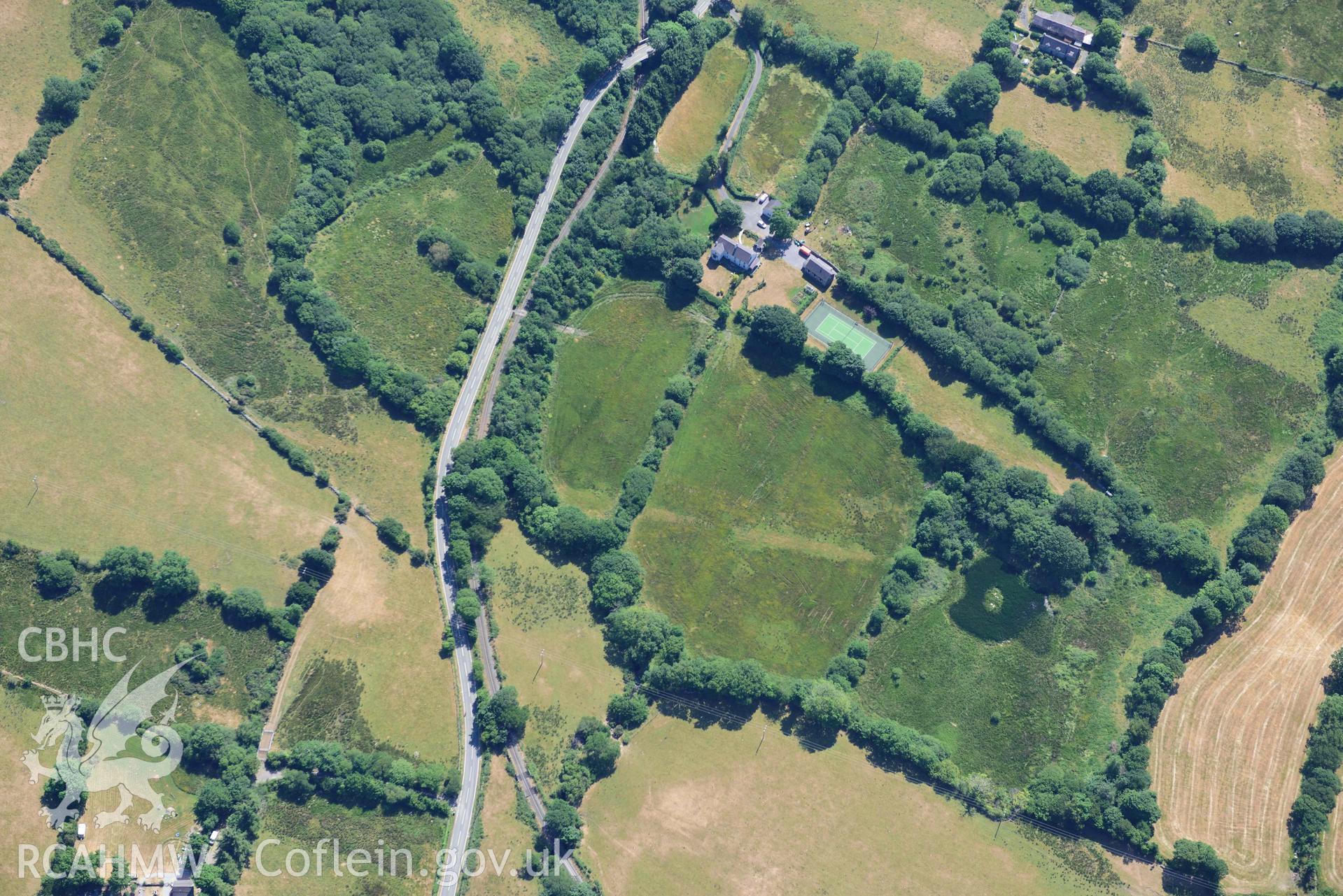 Aerial photograph: Roman road passing through Rhos Isaf. Parchmarks at Dolau Gwyn. Crown: CHERISH PROJECT 2018. Produced with EU funds through the Ireland Wales Co-operation Programme 2014-2020 (NGR: SH489586)