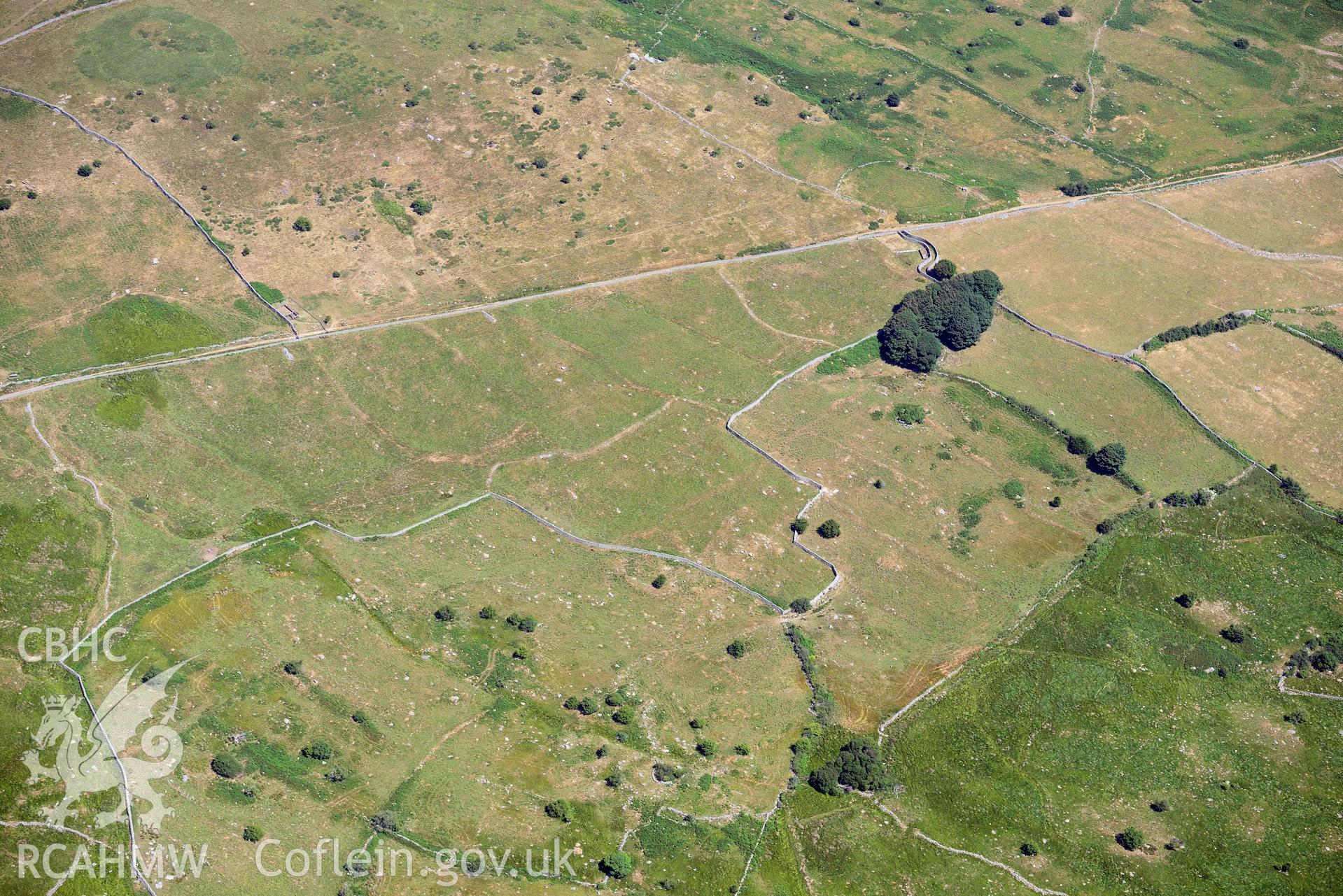 Aerial photograph: Homestead near Maen-y-bardd, Rowen. Crown: CHERISH PROJECT 2018. Produced with EU funds through the Ireland Wales Co-operation Programme 2014-2020 (NGR: SH739715)