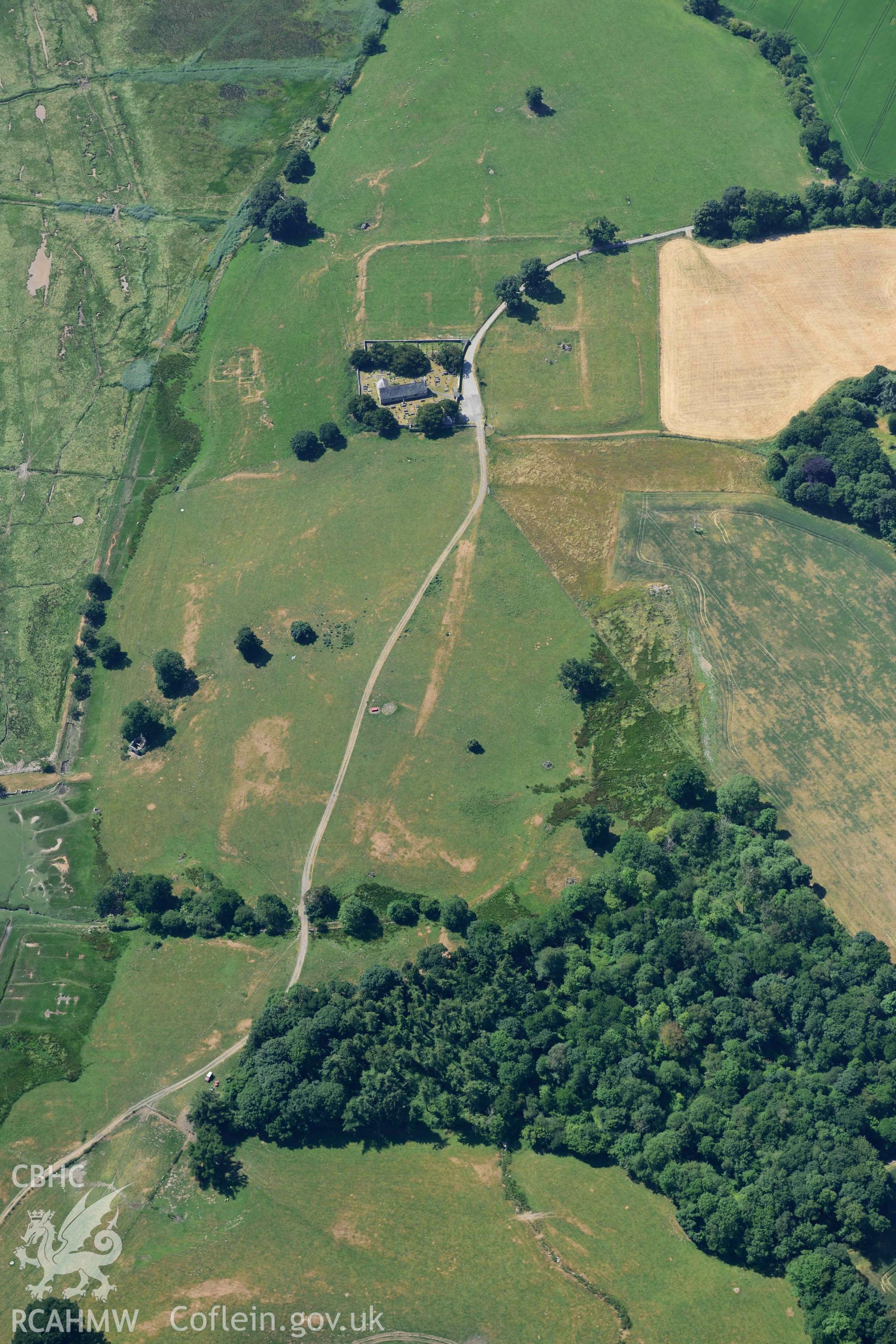 Aerial photograph: Caerhun Roman fort, with extensive parchmarks, view over vicus from north. Crown: CHERISH PROJECT 2018. Produced with EU funds through the Ireland Wales Co-operation Programme 2014-2020 (NGR: SH776703)