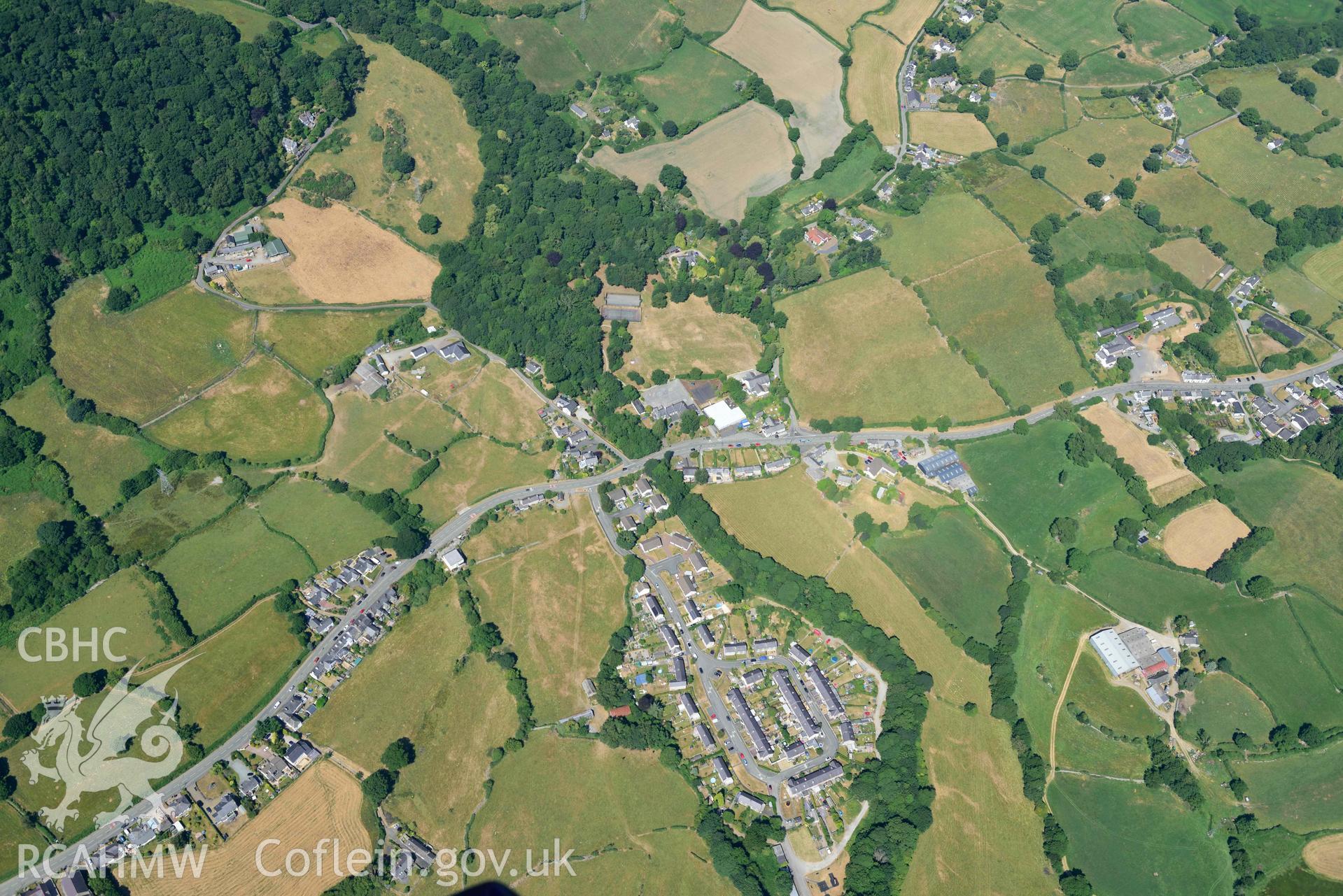 Aerial photograph: Talybont village, with non-archaeological parchmarks. Crown: CHERISH PROJECT 2018. Produced with EU funds through the Ireland Wales Co-operation Programme 2014-2020 (NGR: SH766688)