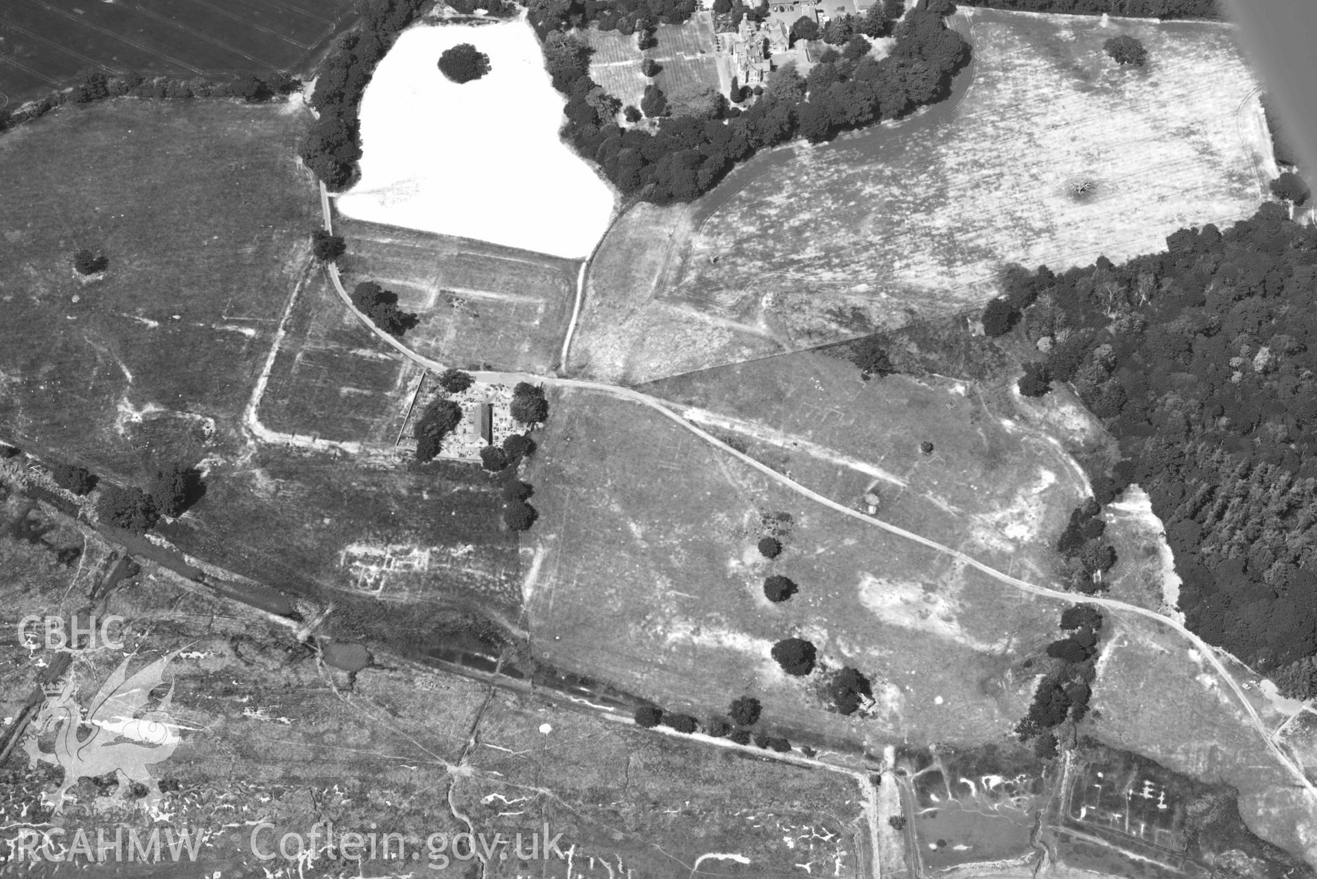 Aerial photograph: Caerhun Roman fort, with extensive parchmarks. Crown: CHERISH PROJECT 2018. Produced with EU funds through the Ireland Wales Co-operation Programme 2014-2020 (NGR: SH776703)