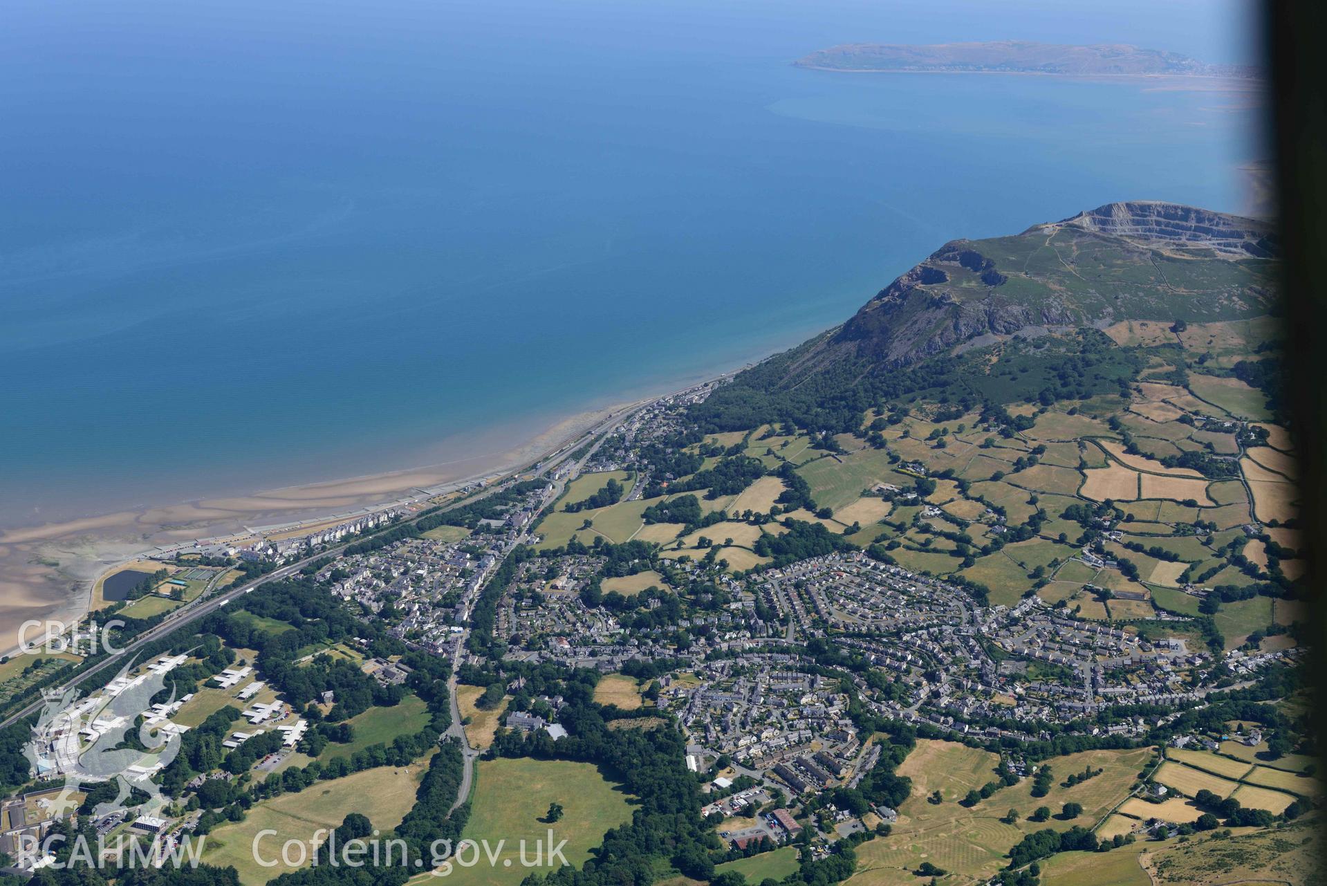 Aerial photograph: Llanfairfechan town, view from the southwest. Crown: CHERISH PROJECT 2018. Produced with EU funds through the Ireland Wales Co-operation Programme 2014-2020 (NGR: SH680748)