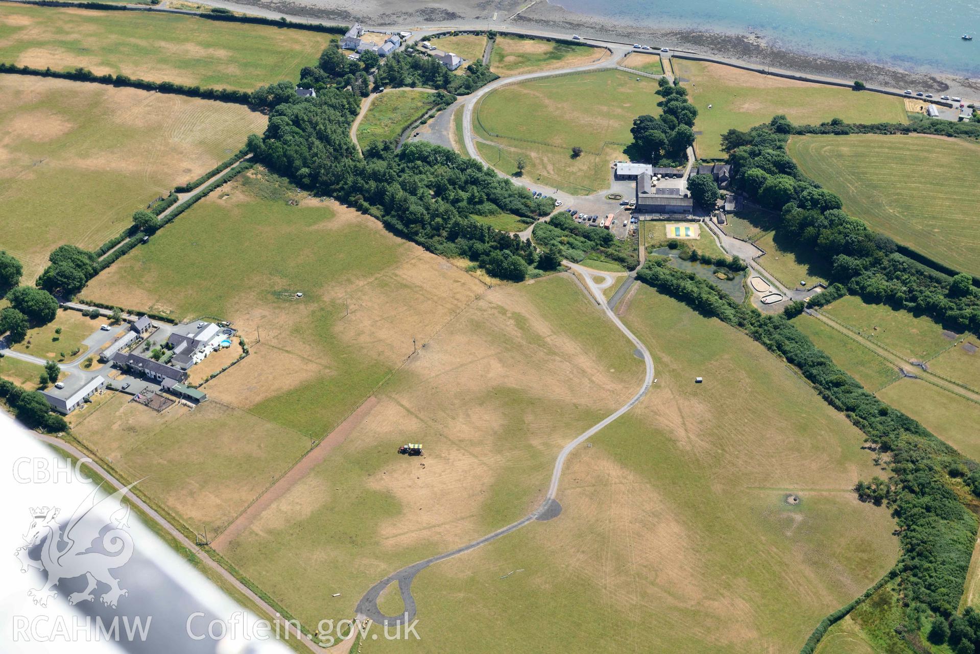 Aerial photograph: Tai Cochion Roman settlement, parchmarks of boundaries. Crown: CHERISH PROJECT 2018. Produced with EU funds through the Ireland Wales Co-operation Programme 2014-2020 (NGR: SH479656)