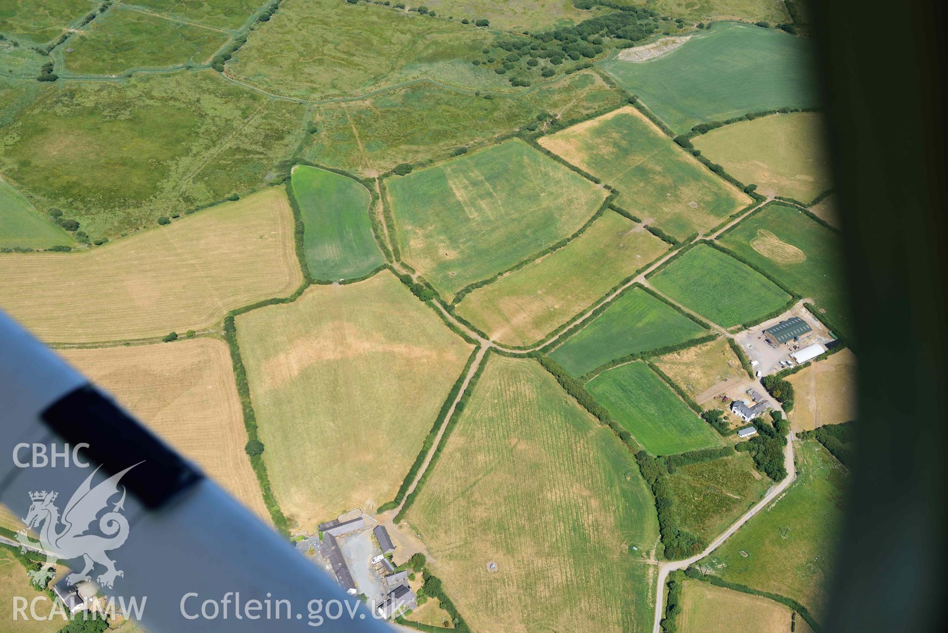 Aerial photograph: Taigwynion, cropmarks of early fields. Crown: CHERISH PROJECT 2018. Produced with EU funds through the Ireland Wales Co-operation Programme 2014-2020 (NGR: SH446561)